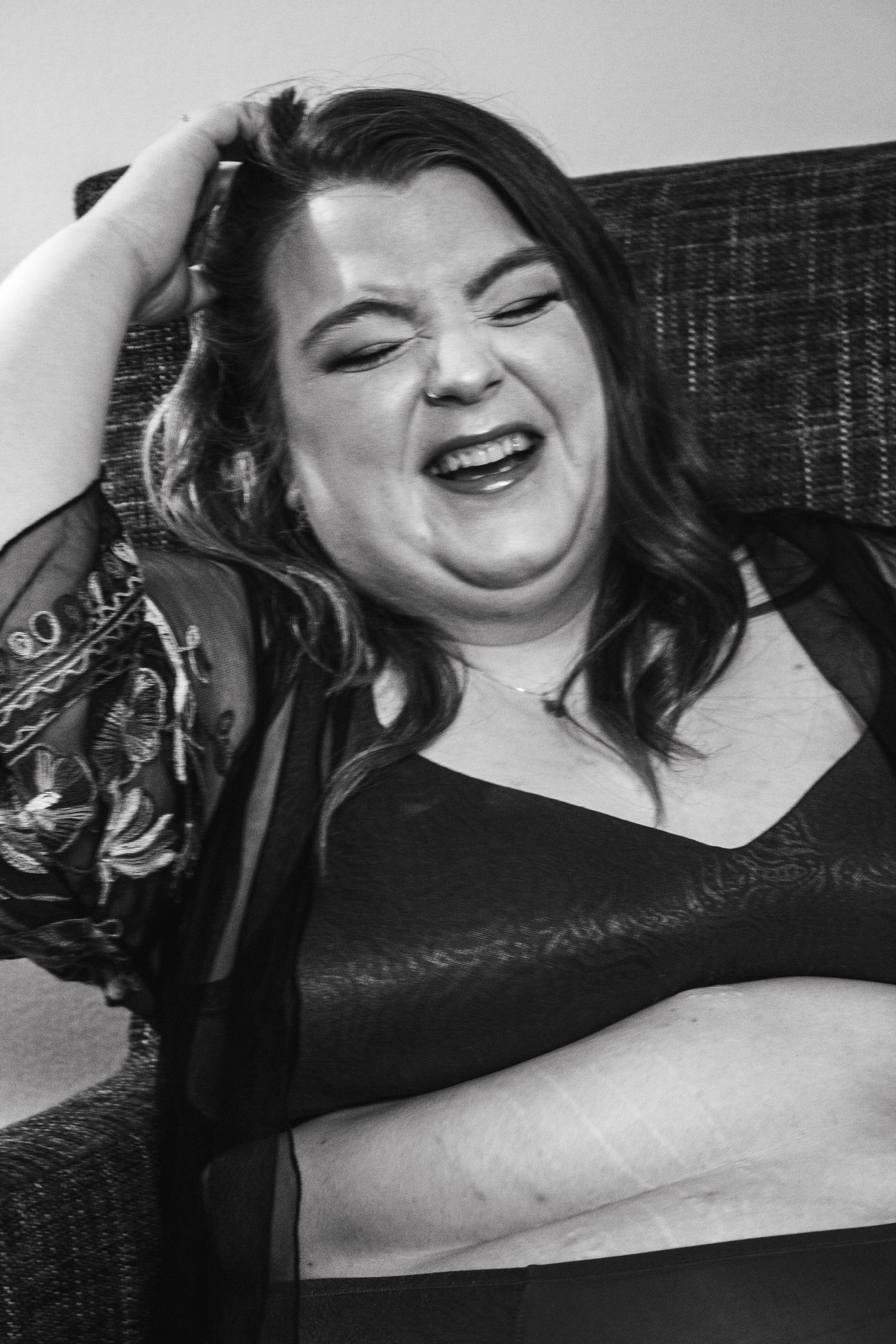 Expressive black and white portrait series showing joyful moments.