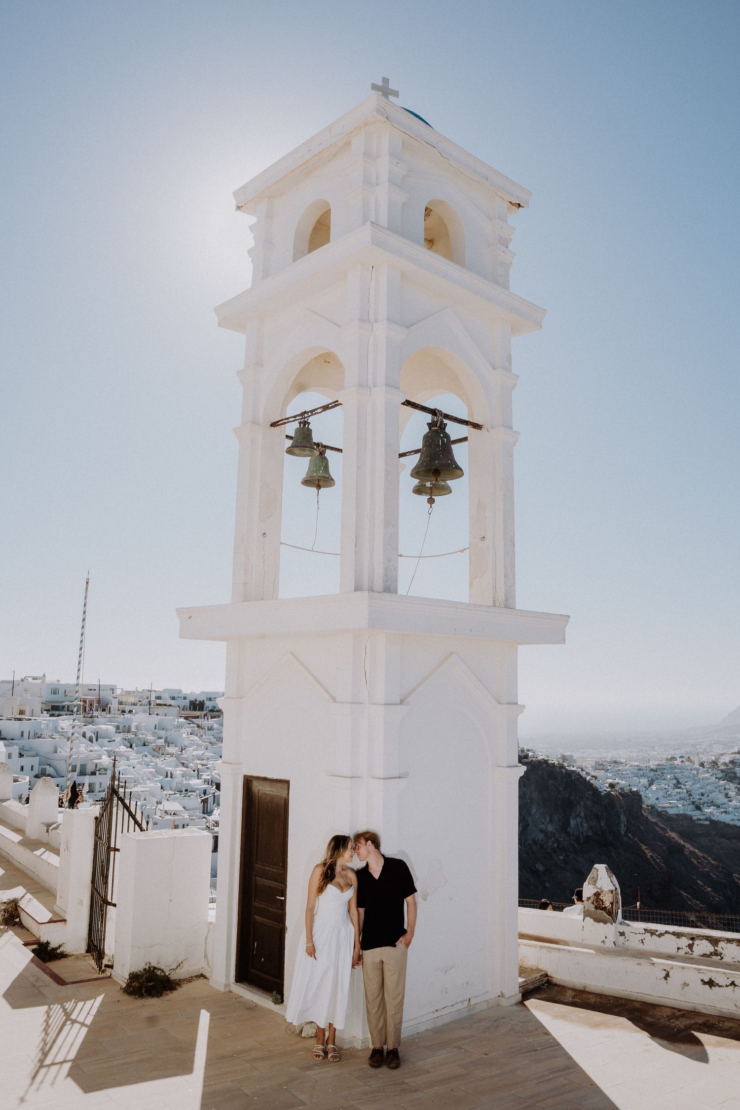 santorini photographer couple session oia sunset blue domes romantic photoshoot greece