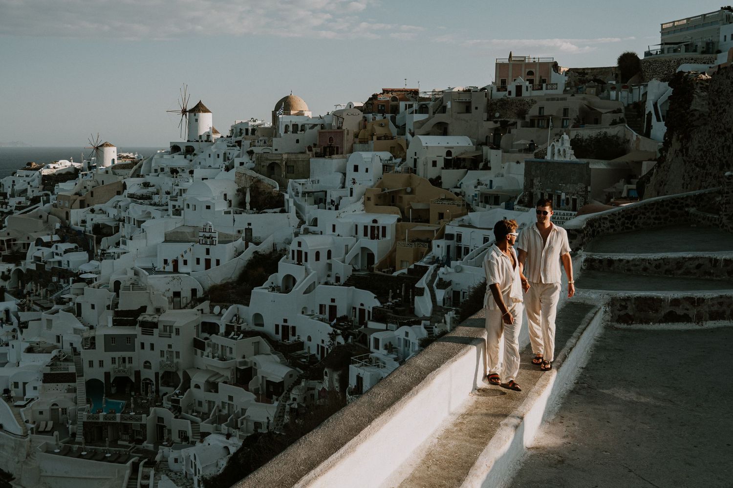 santorini engagement photoshoot cinematic couple oia santorini photographer luxury session