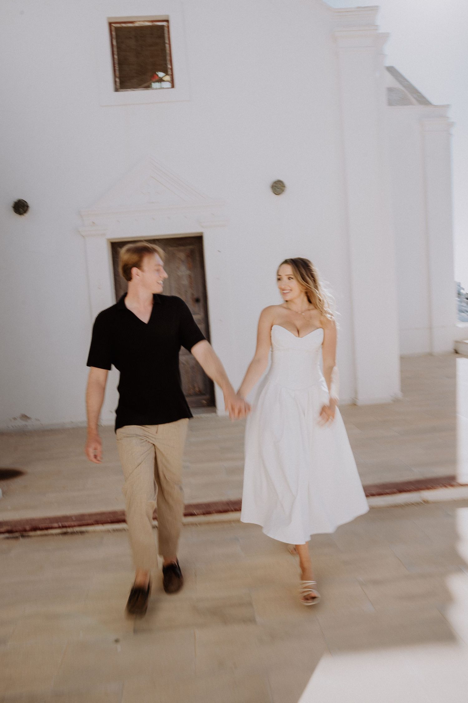 santorini engagement photoshoot cinematic couple photography oia santorini photographer luxury session