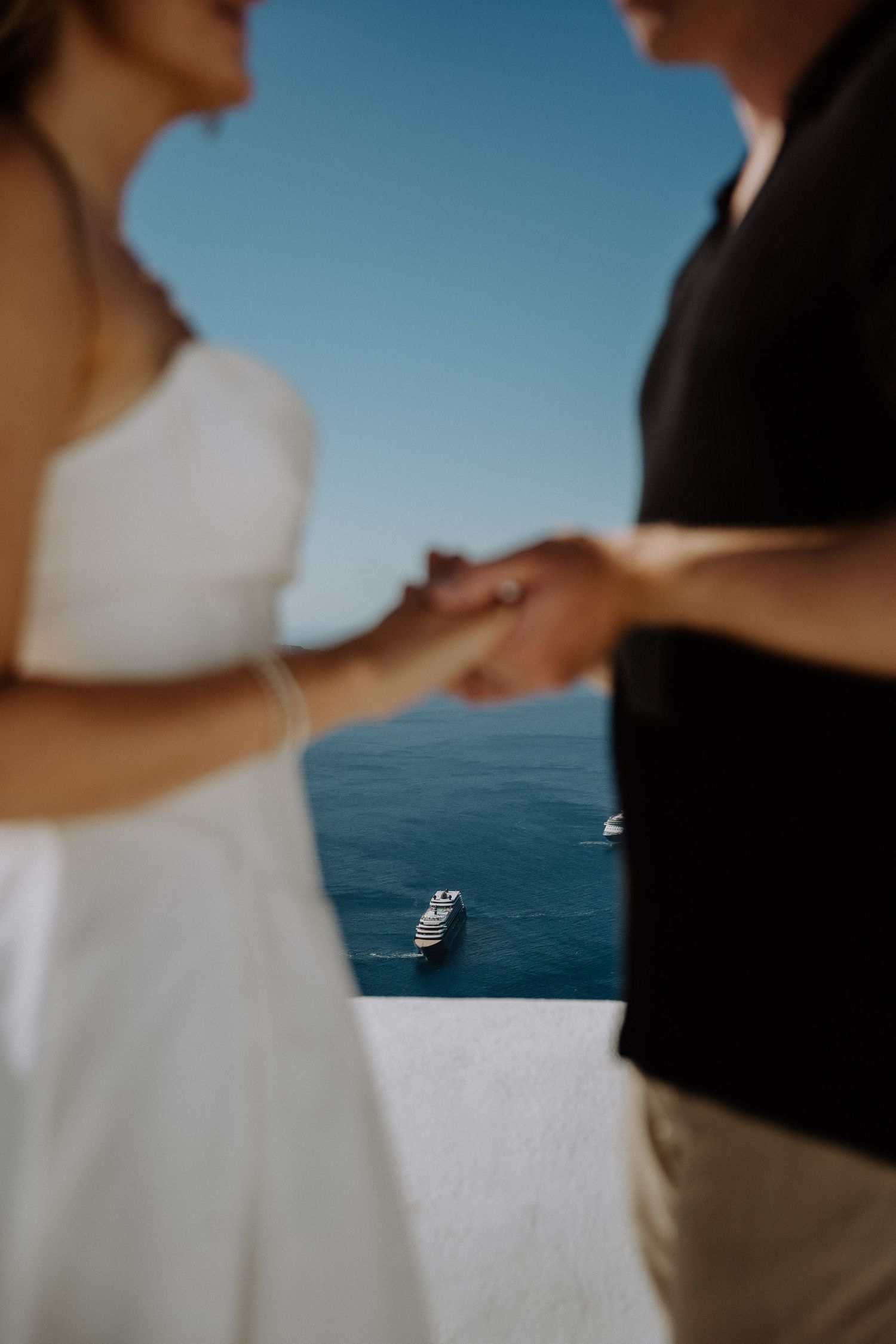 santorini elopement photographer luxury wedding santorini caldera couple ceremony aegean sea view