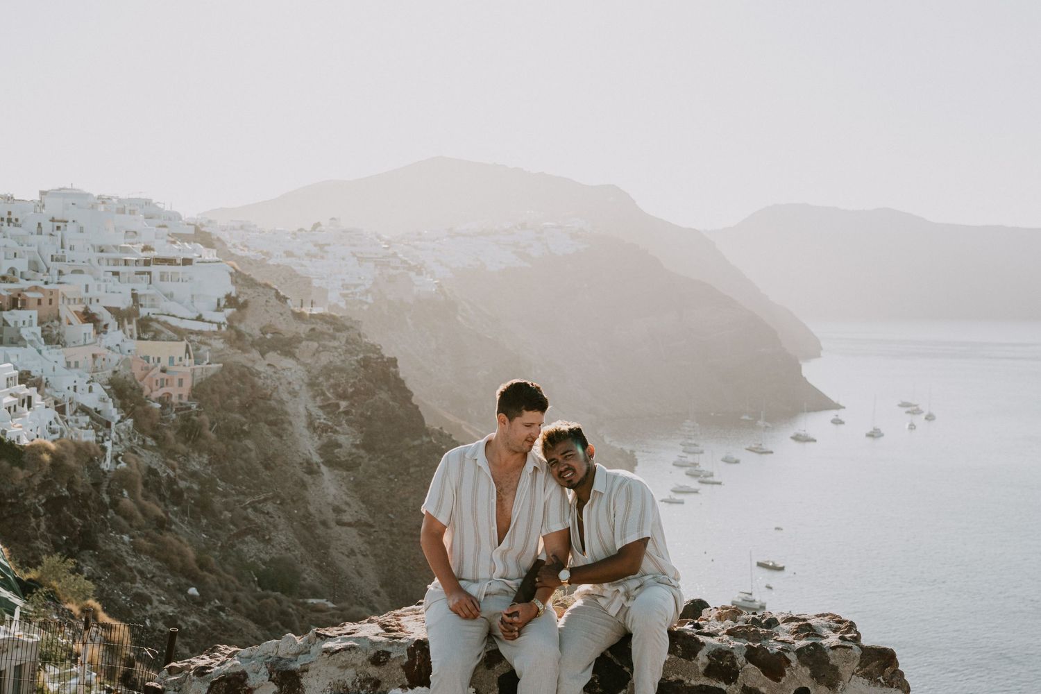 santorini engagement photoshoot cinematic couple oia santorini photographer luxury session