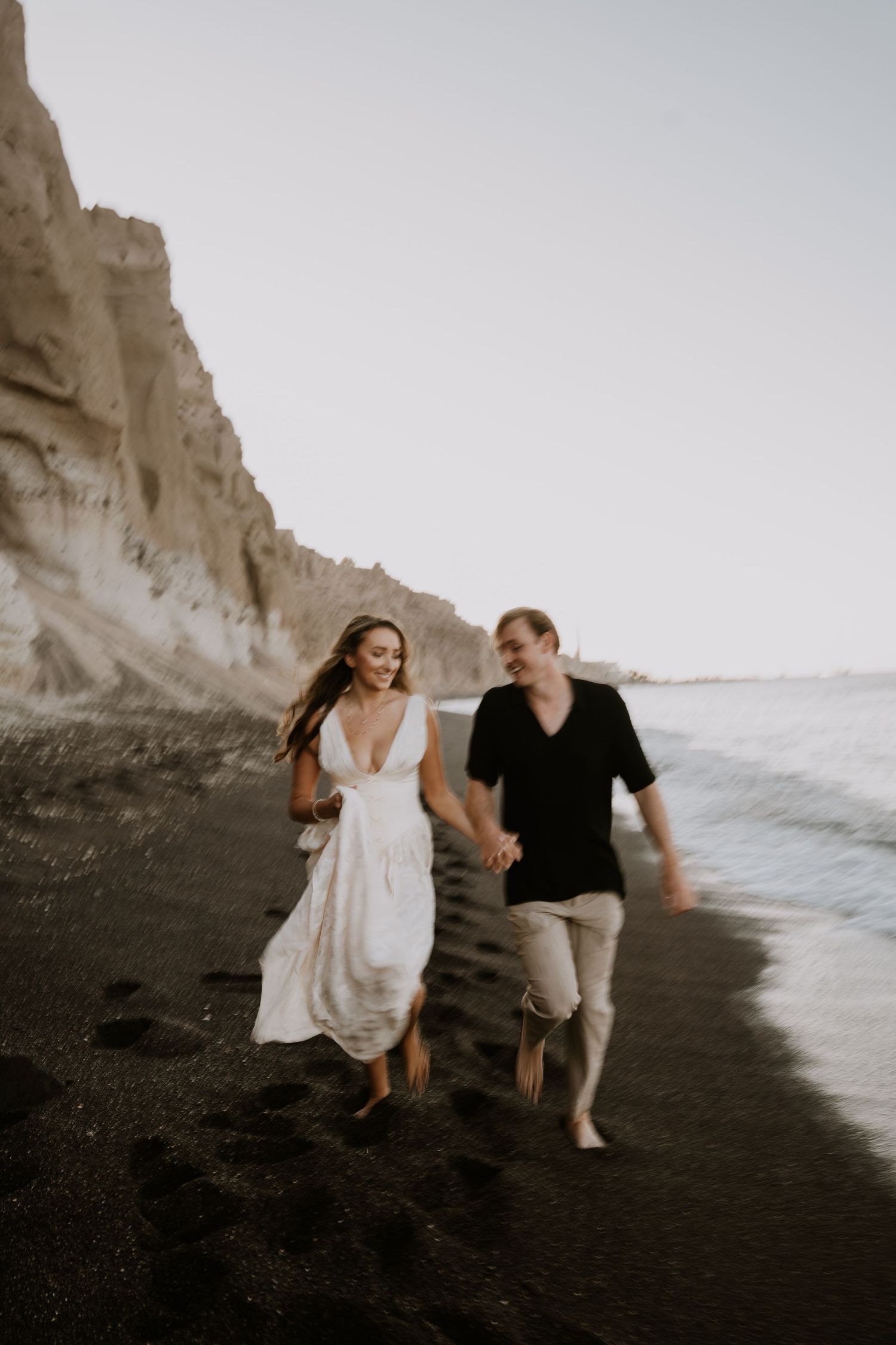santorini photographer couple session oia sunset blue domes romantic photoshoot greece