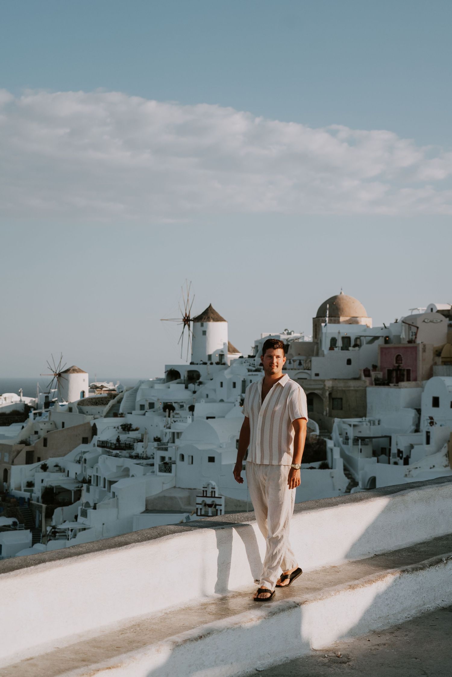 santorini engagement photoshoot cinematic couple oia santorini photographer luxury session
