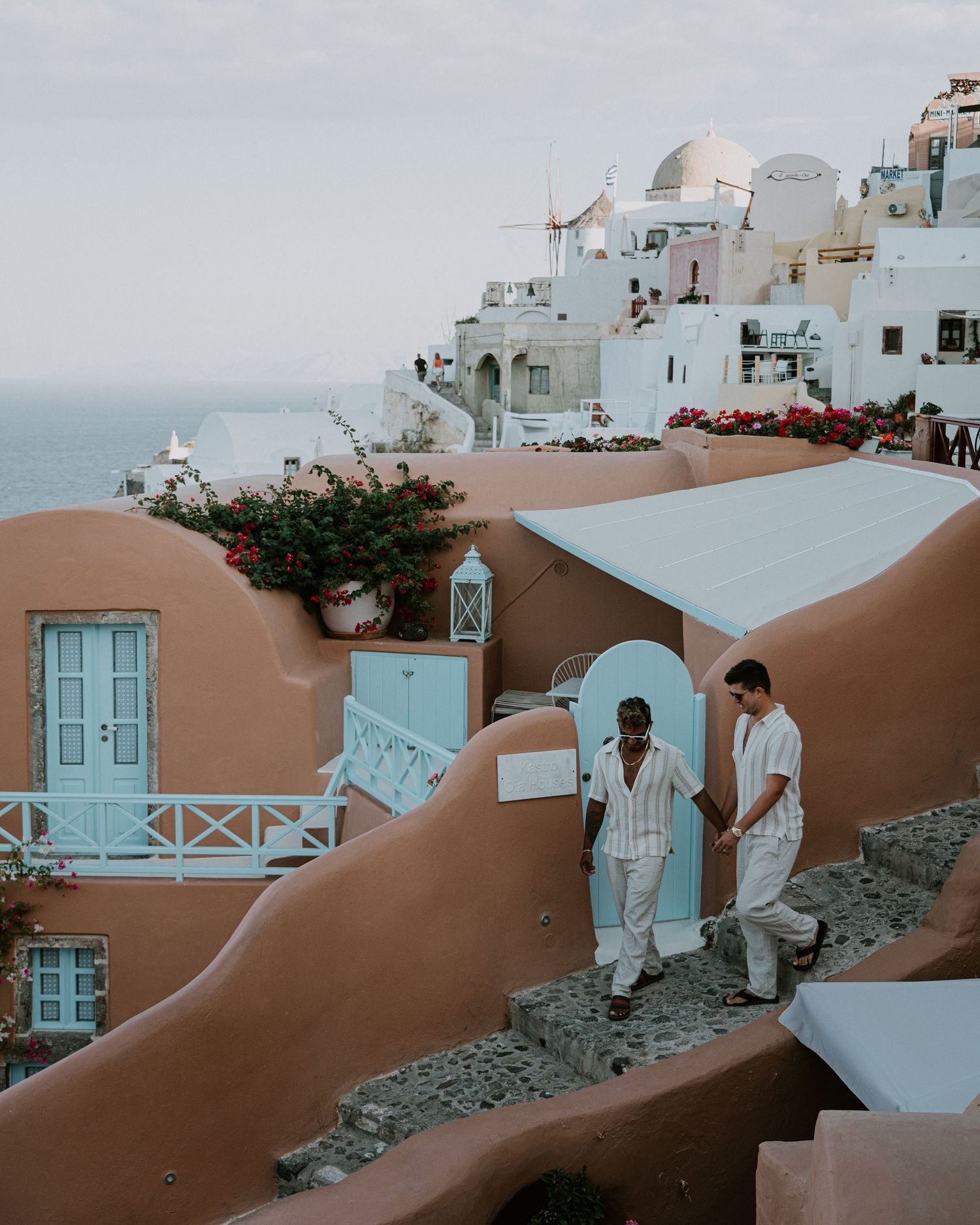 santorini engagement photoshoot cinematic couple oia santorini photographer luxury session