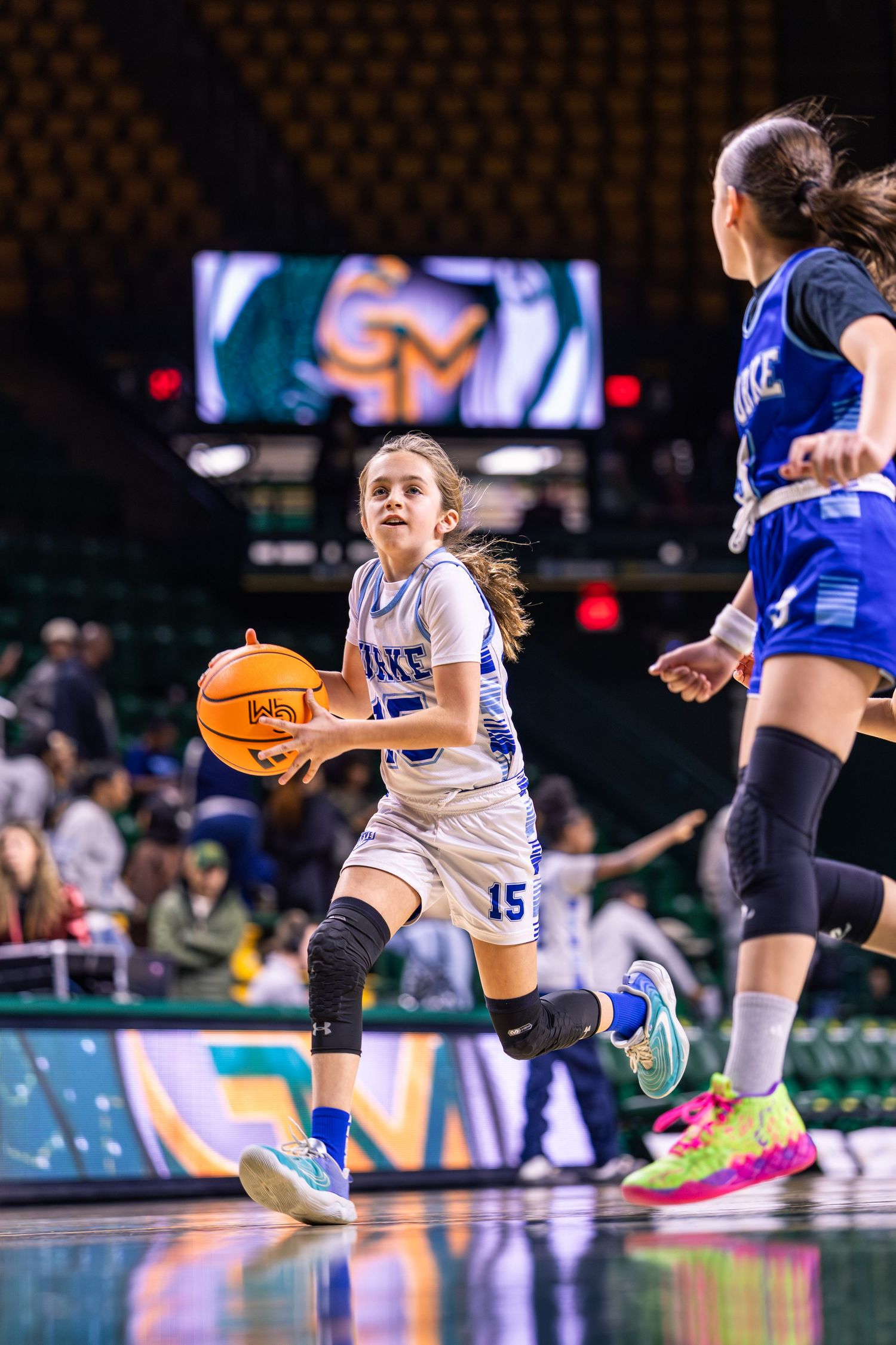 Baby Sharks basketball action at GMU EagleBank Arena by Sporty-Clips Media. Professional R1 court-side photography with elite separation.