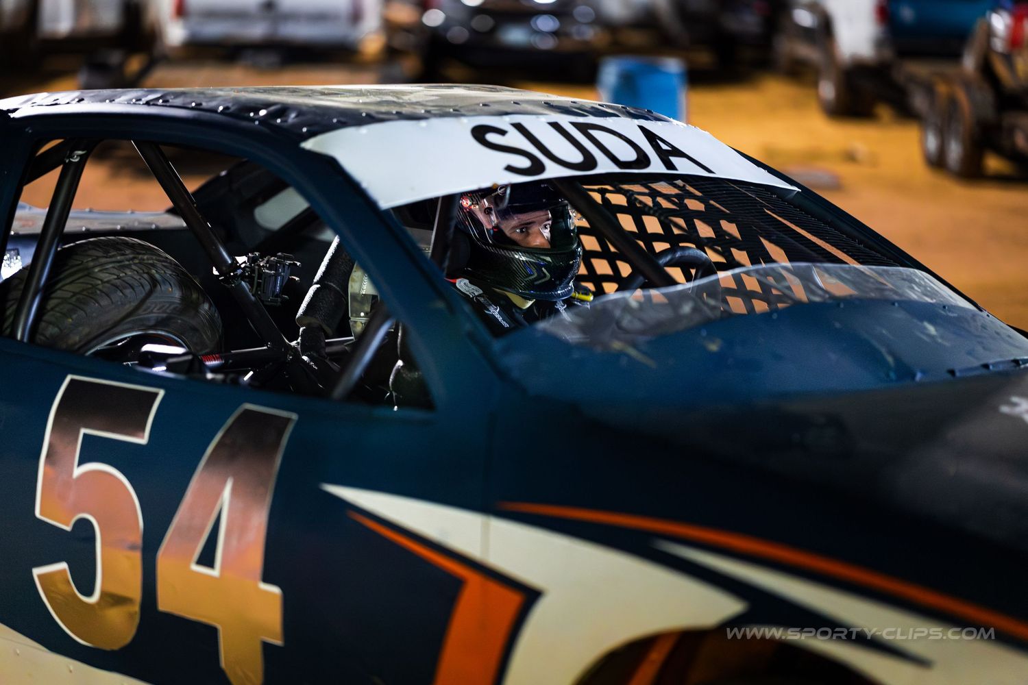 QRF Racing dirt track car at Potomac Speedway. High-speed motorsports action photography R&D by Fairfax-based Sporty-Clips Media.