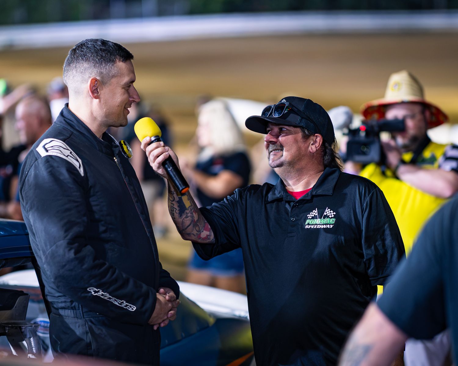 QRF Racing driver #54 Adam Suda interviewed at Potomac Speedway in August 2026. Dirt track racing media by Sporty-Clips Media.