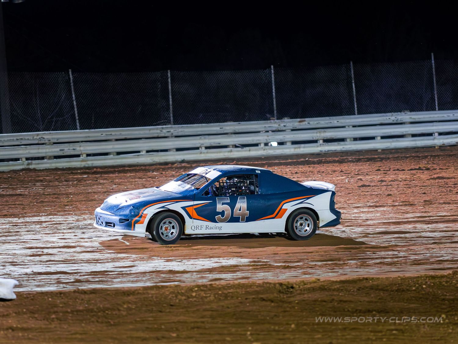 QRF Racing dirt track car at Potomac Speedway. High-speed motorsports action photography R&D by Fairfax-based Sporty-Clips Media.