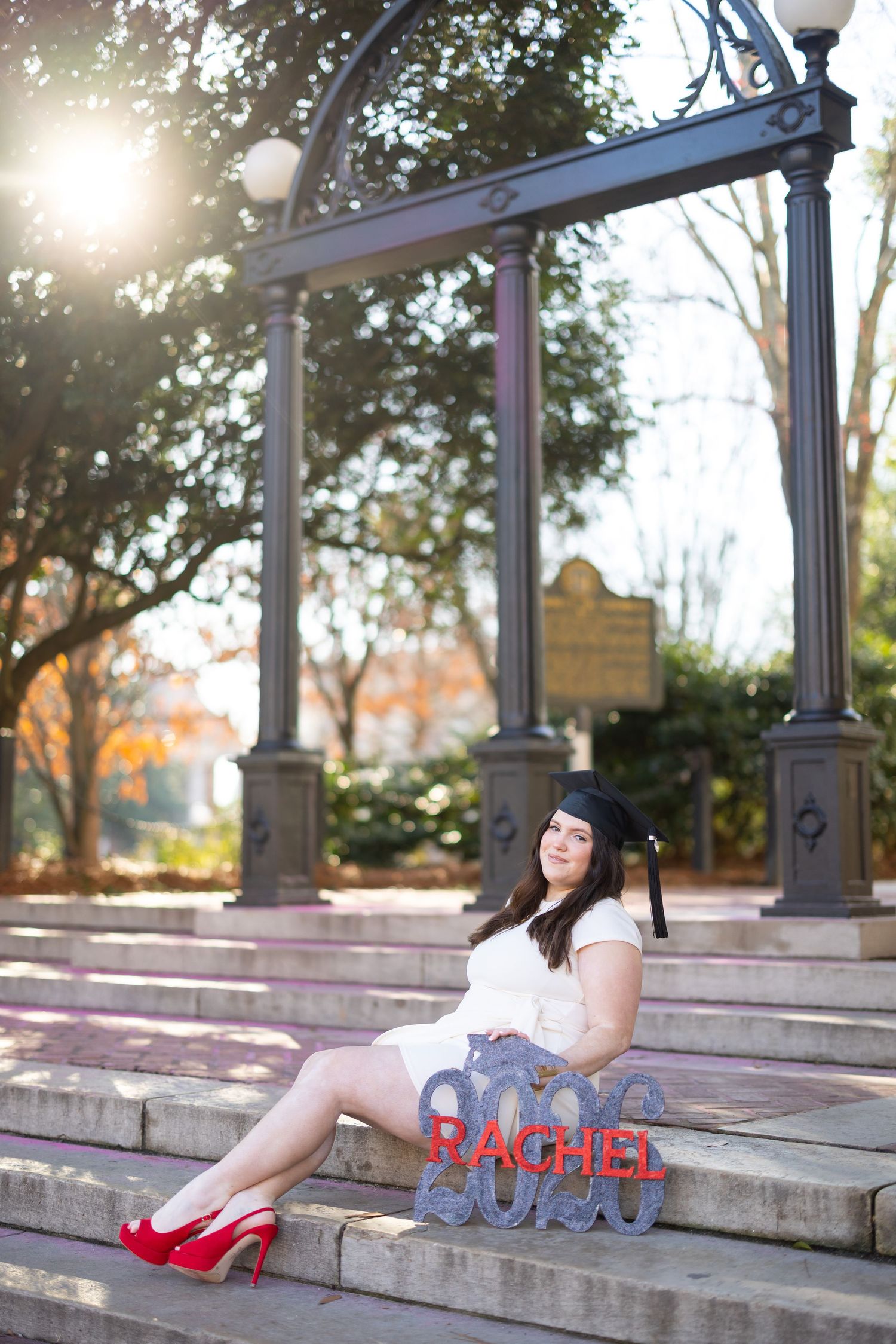 A series of five connected photos showing red high heels and legs on concrete steps in warm sunlight.