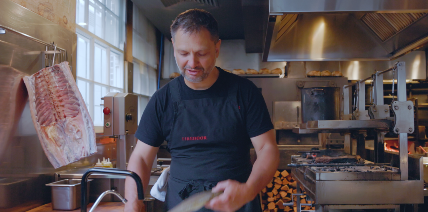 Wollongong based videographer captures Lennox Hastie Chef and owner of Firedoor wood-fired grill station in a restaurant kitchen.
