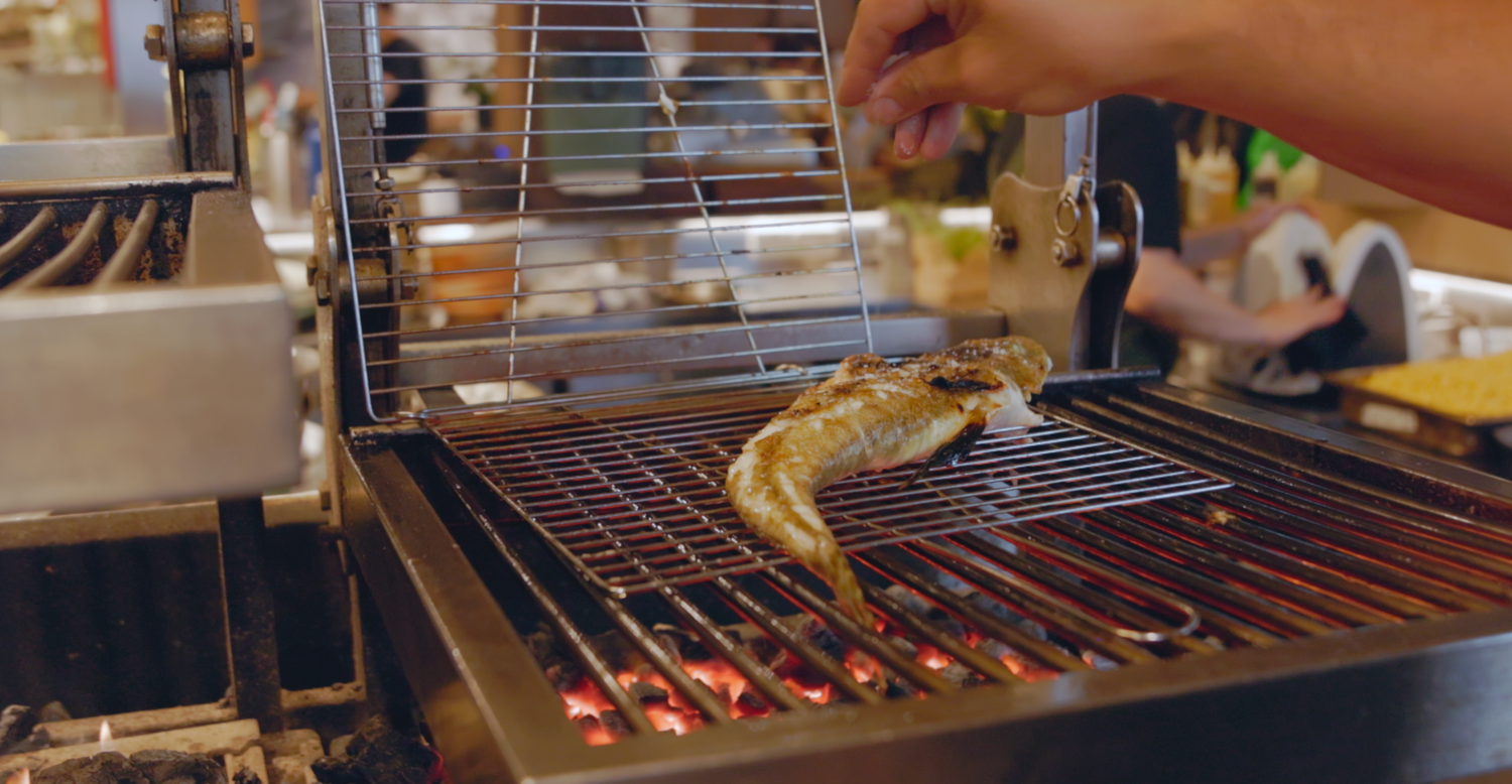 Sutherland Shire based videographer captures Lennox Hastie Chef and owner of Firedoor cooking flathead over fire