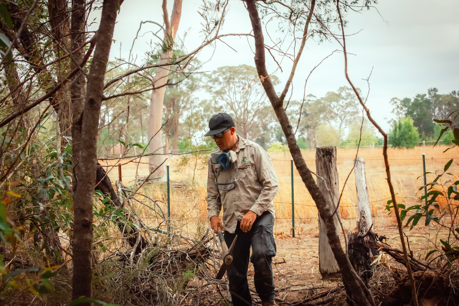 Branding and business photography in Sydney shows hunters in camouflage gear walking through wooded terrain during an outdoor expedition.