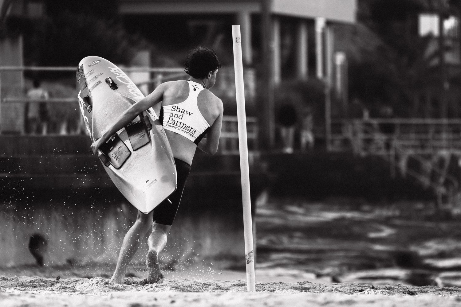 Sydney Sutherland Shire photographer and videographer Series of surfing action shots showing aerial maneuvers against a beach backdrop.