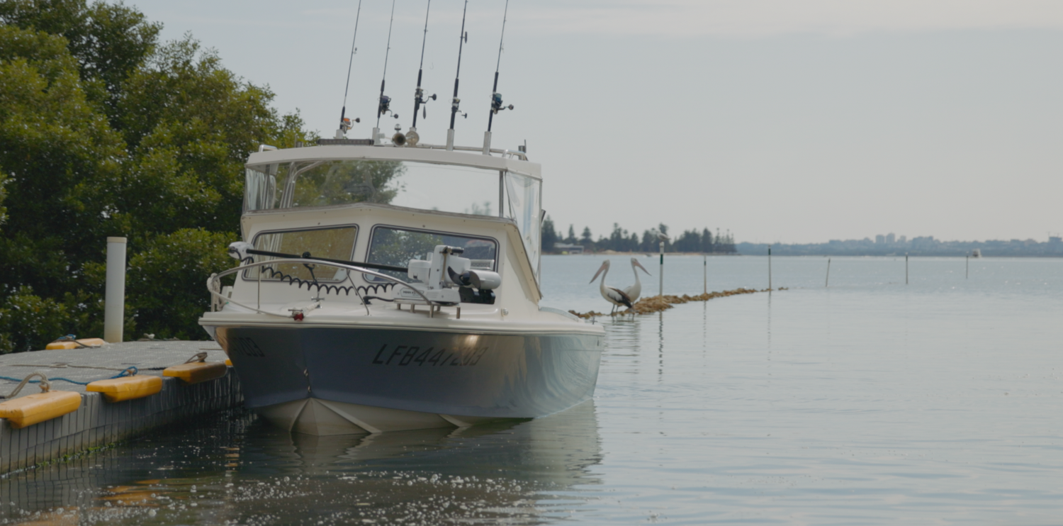 Sutherland Shire based videographer captures a Haines Hunter 19R boat on still water in Cronulla