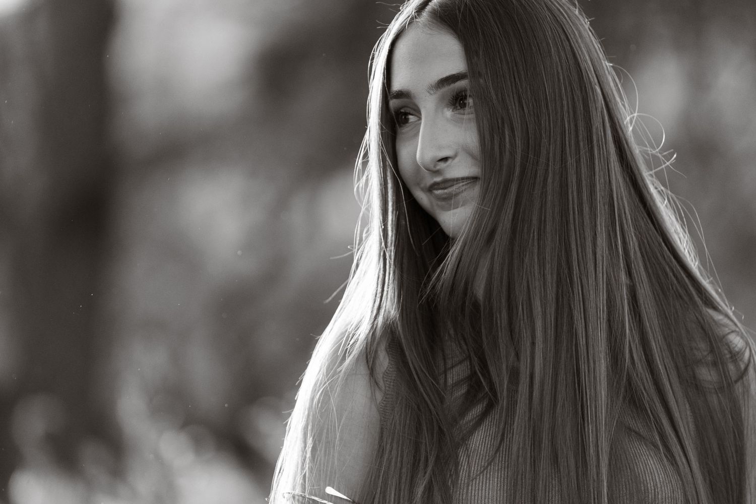 Black and white portrait series with dramatic lighting and natural expressions.