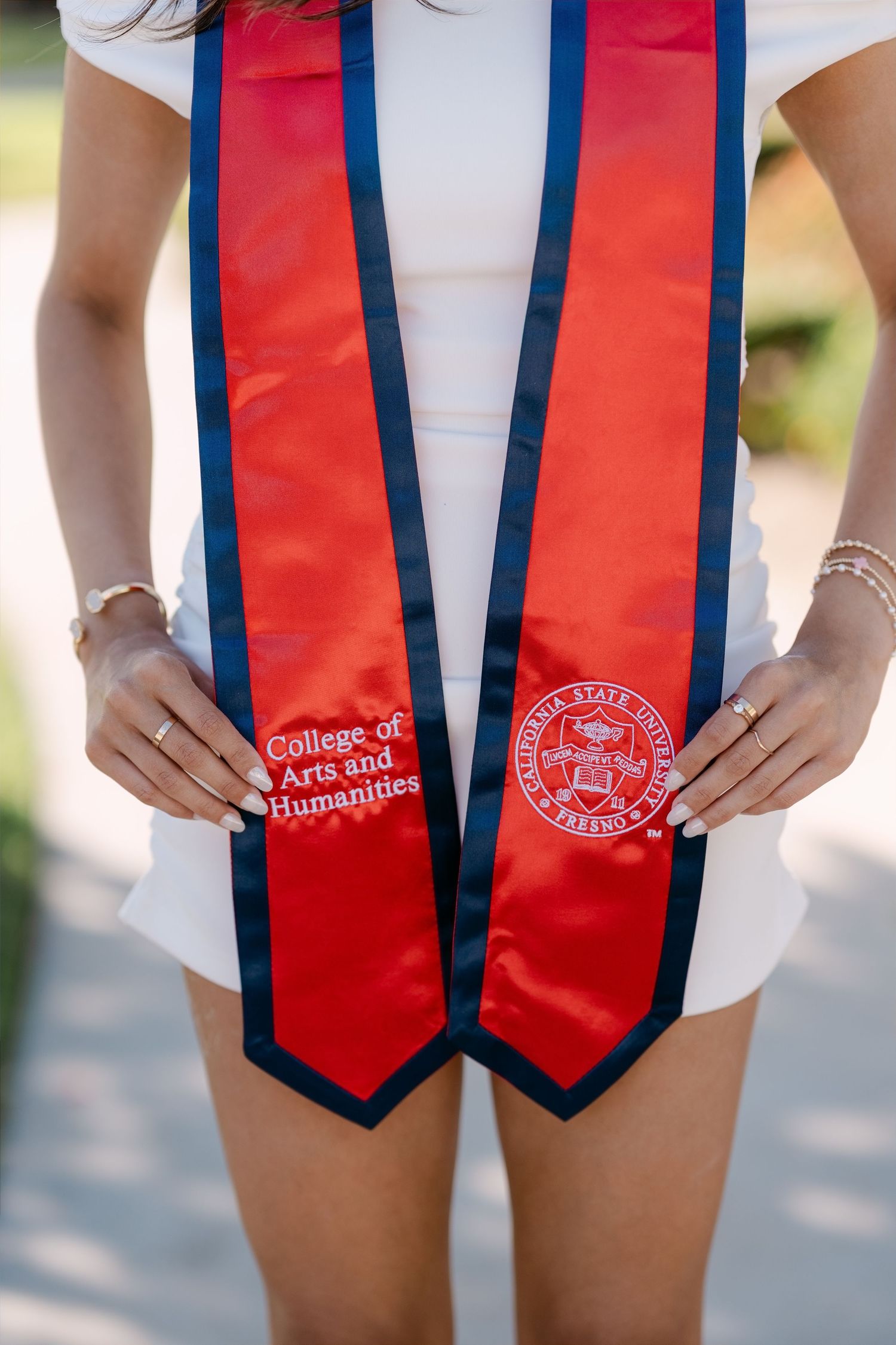 California State University Fresno College of Arts and Humanities graduation stole in red and navy blue.