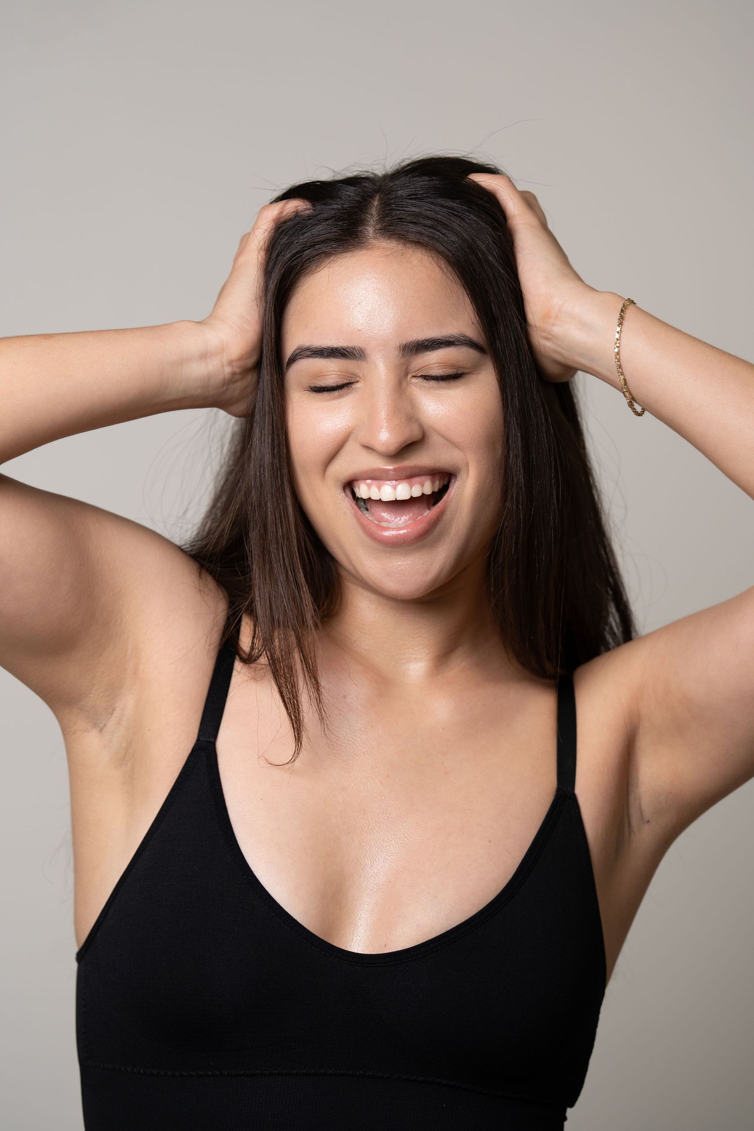 Expressive portrait series against a neutral background showing joyful emotions.