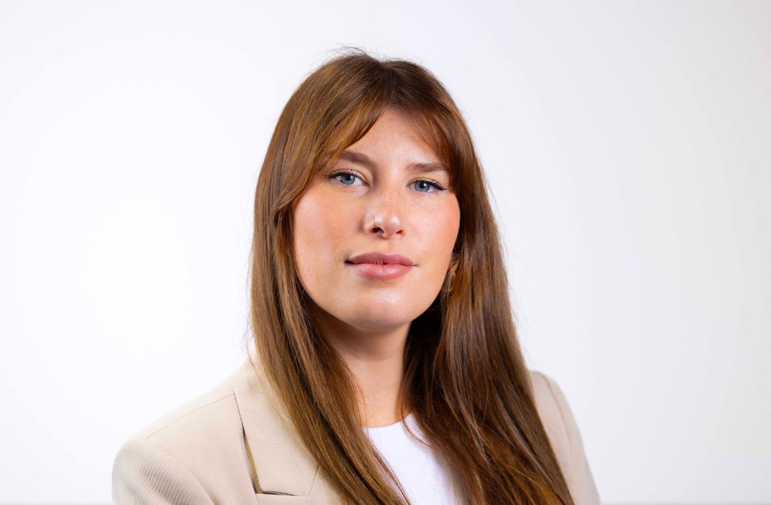 Professional headshots in neutral tones against white background showing various poses. London Event Photographer