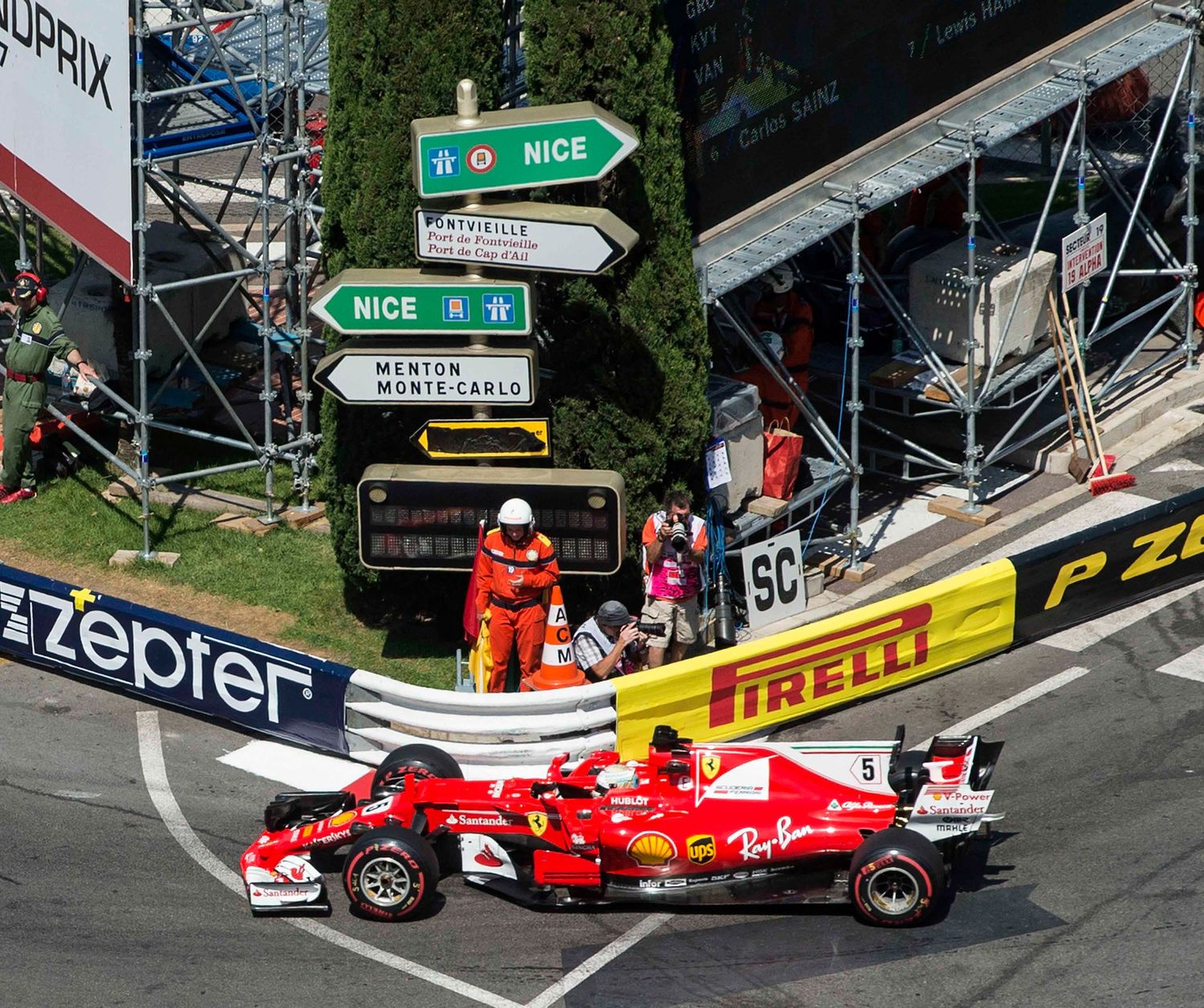Ferrari Formula 1 car racing through a corner at the Monaco Grand Prix street circuit. London Event Photographer