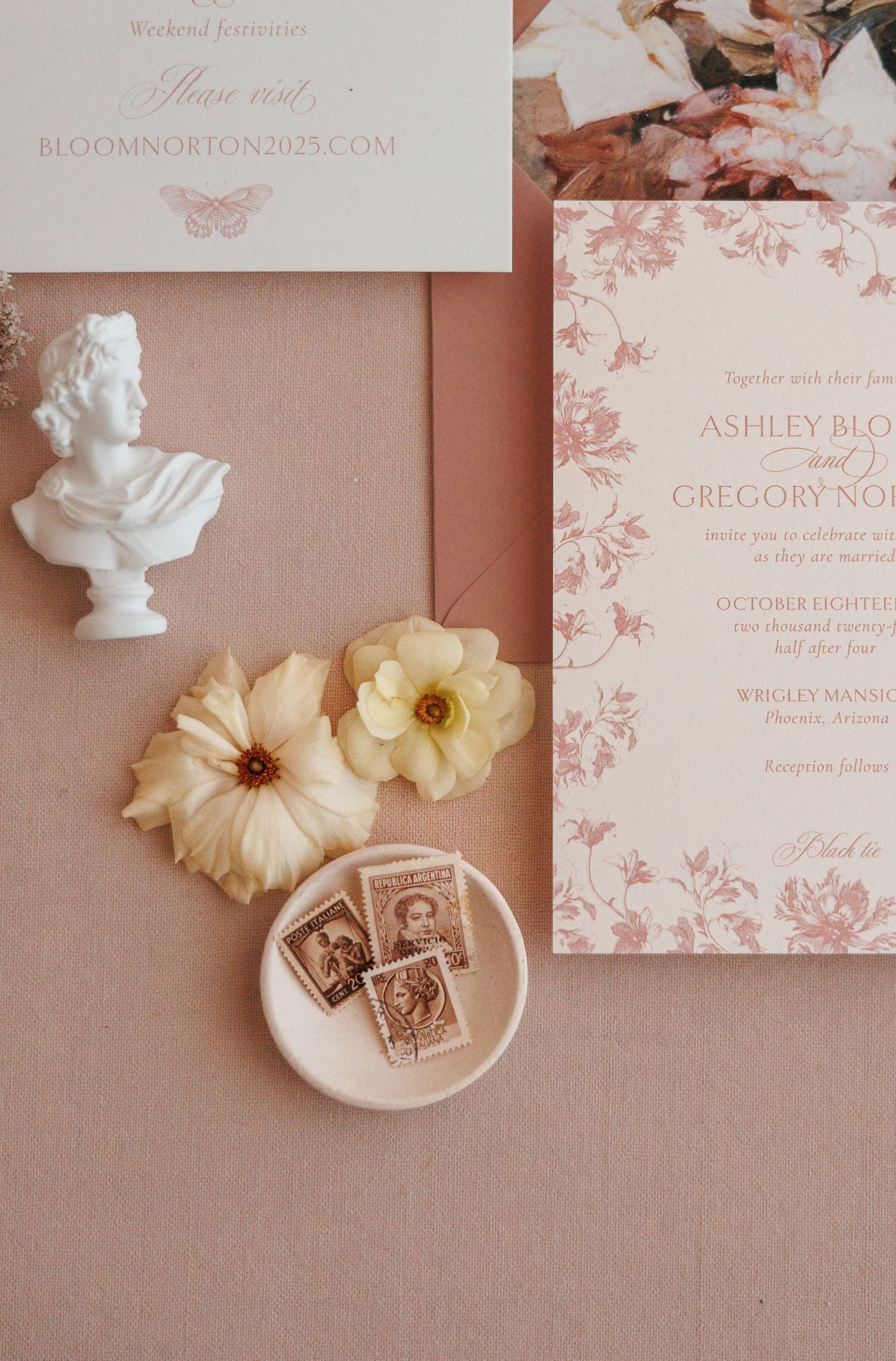 Arizona wedding invitations styled with rings and flowers