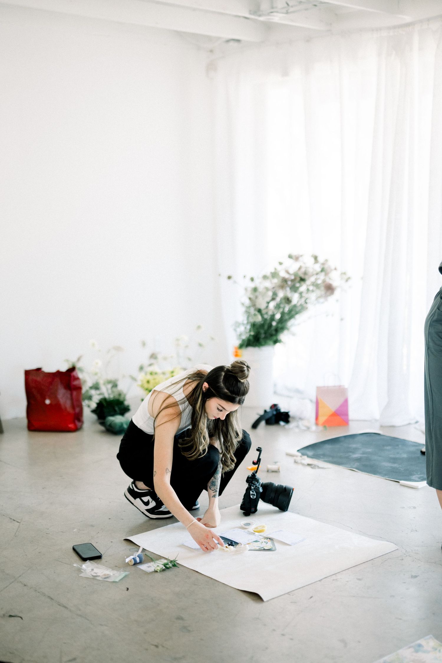 Erin practicing her flatlay wedding photos at Refind Studio in Arizona.