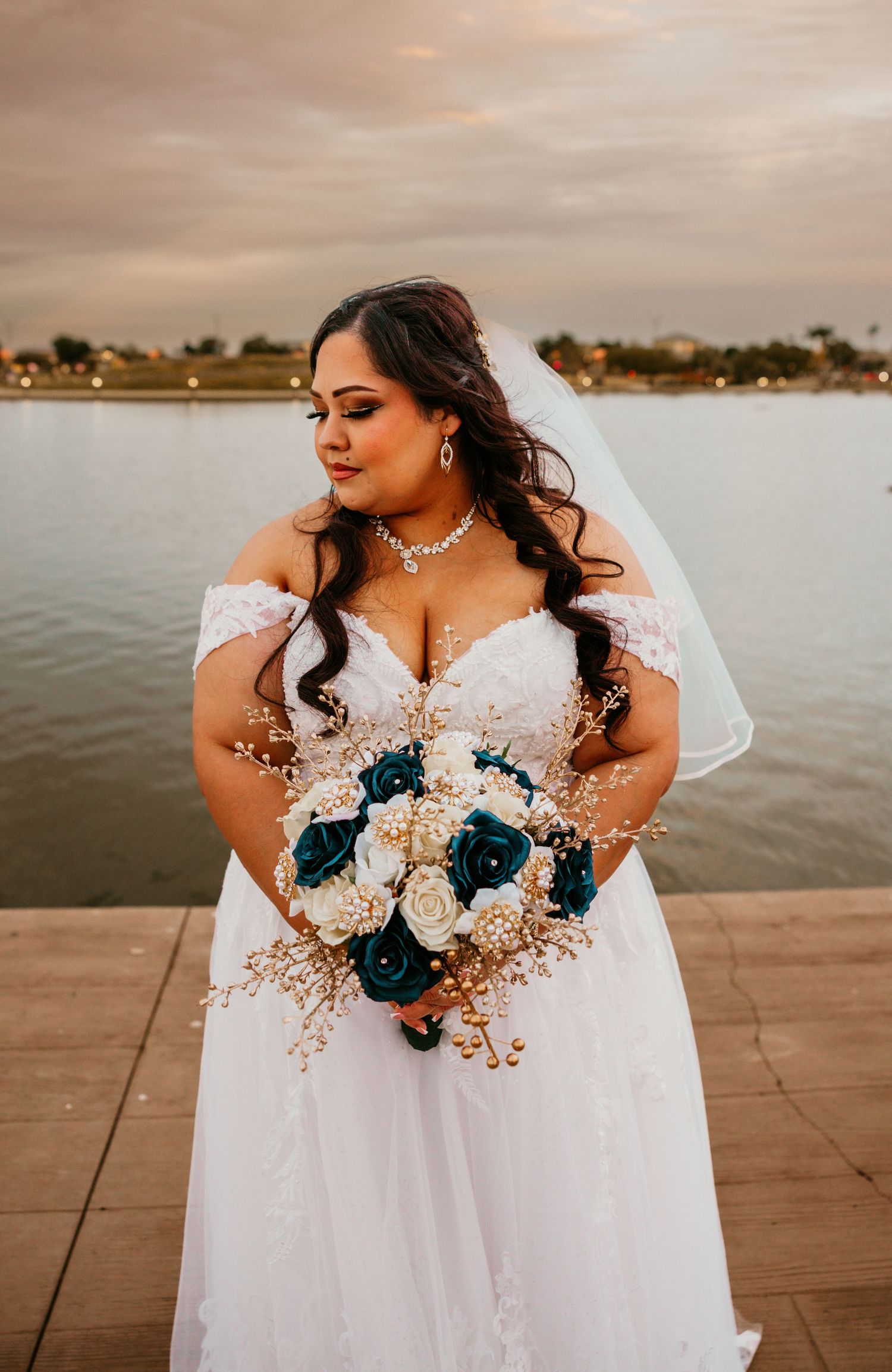 Bride’s bouquet and dress details in warm golden light, Phoenix wedding photographer