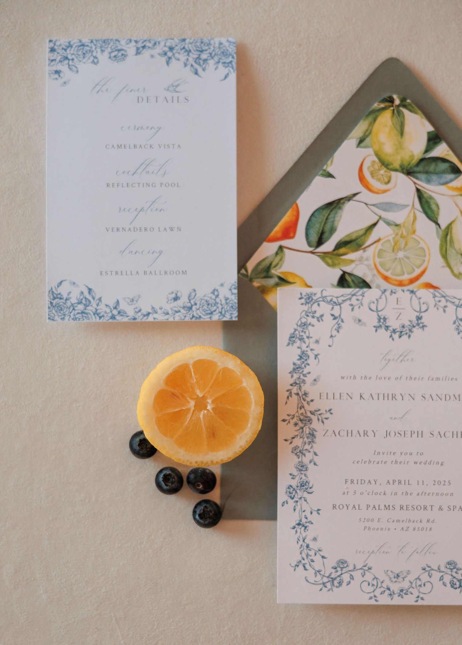 Arizona wedding invitations styled with rings and flowers