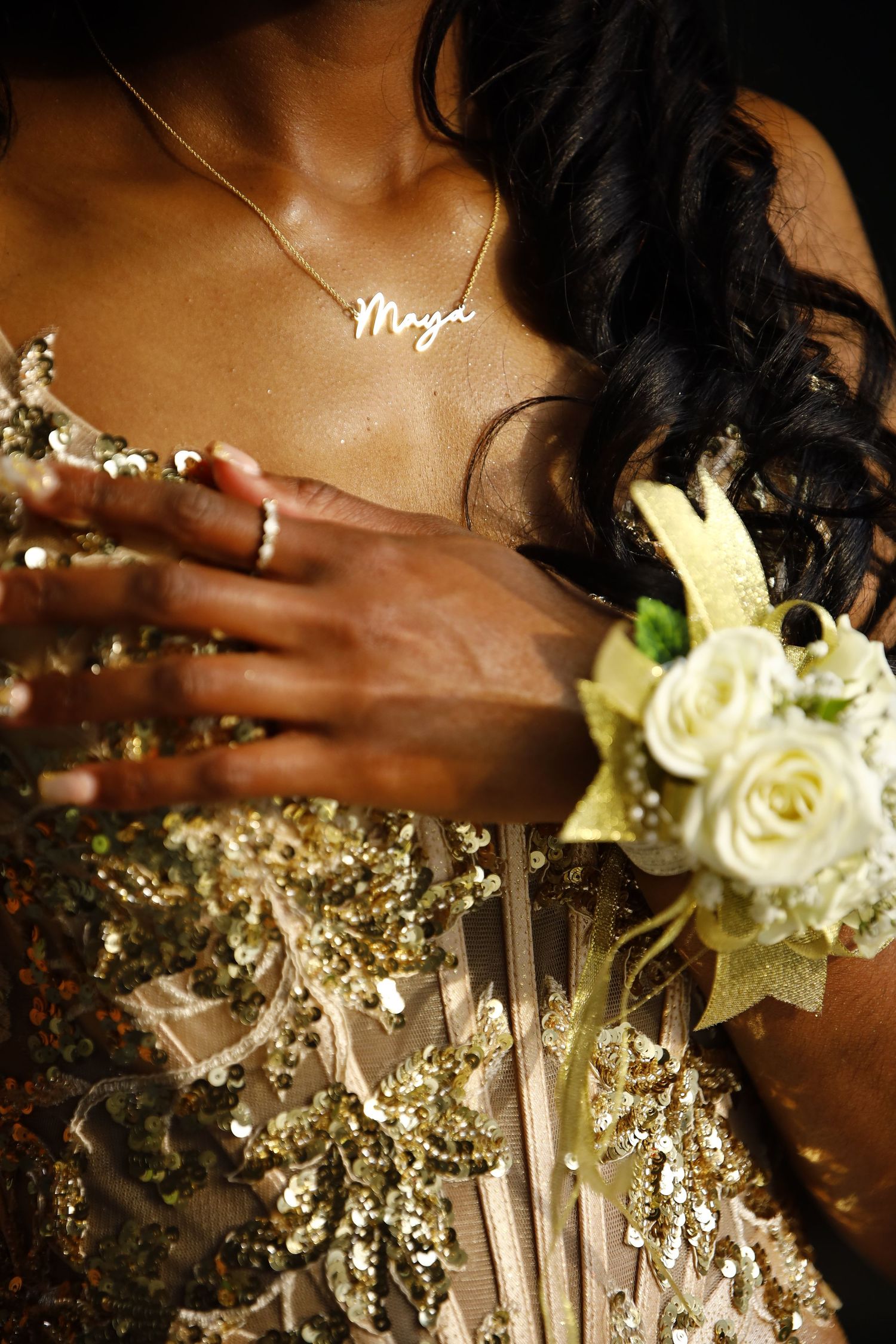 A series of wedding photos showing white roses and delicate floral arrangements against a warm brown background.