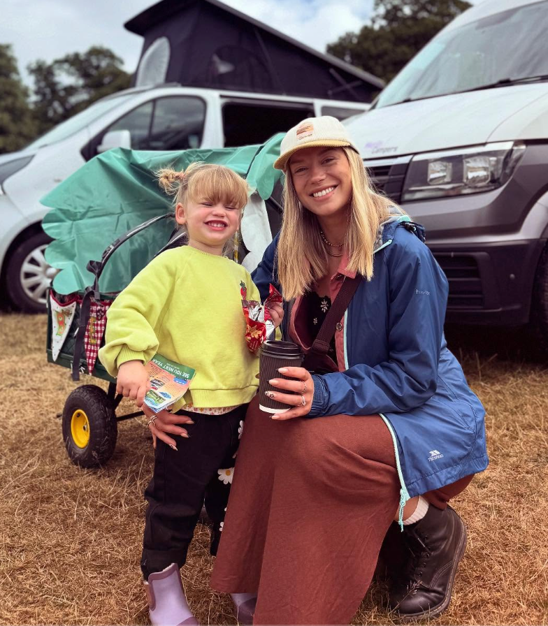Photograph of photographer and her daughter at Camper Jam 2025