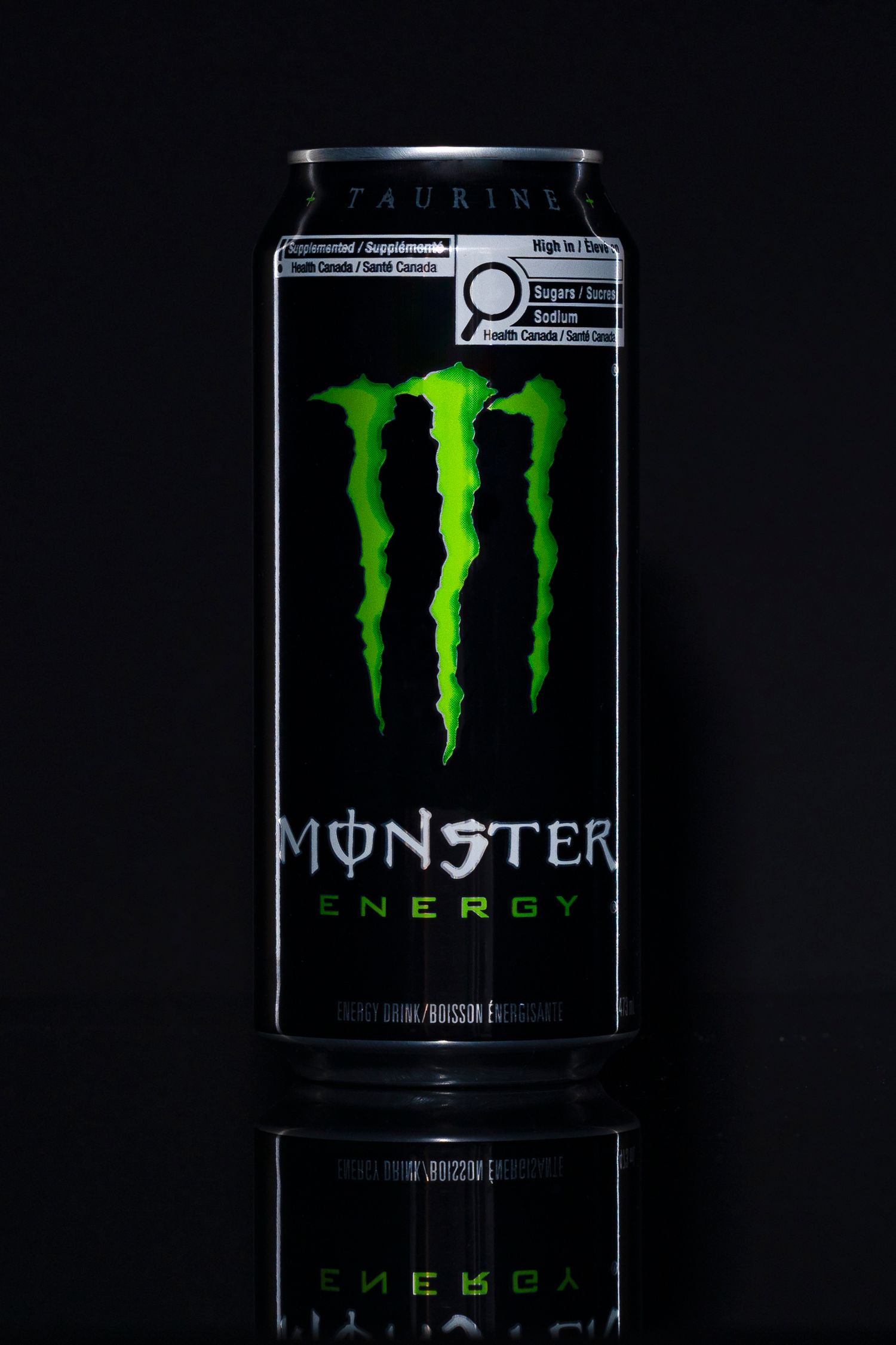 Monster can on a black background