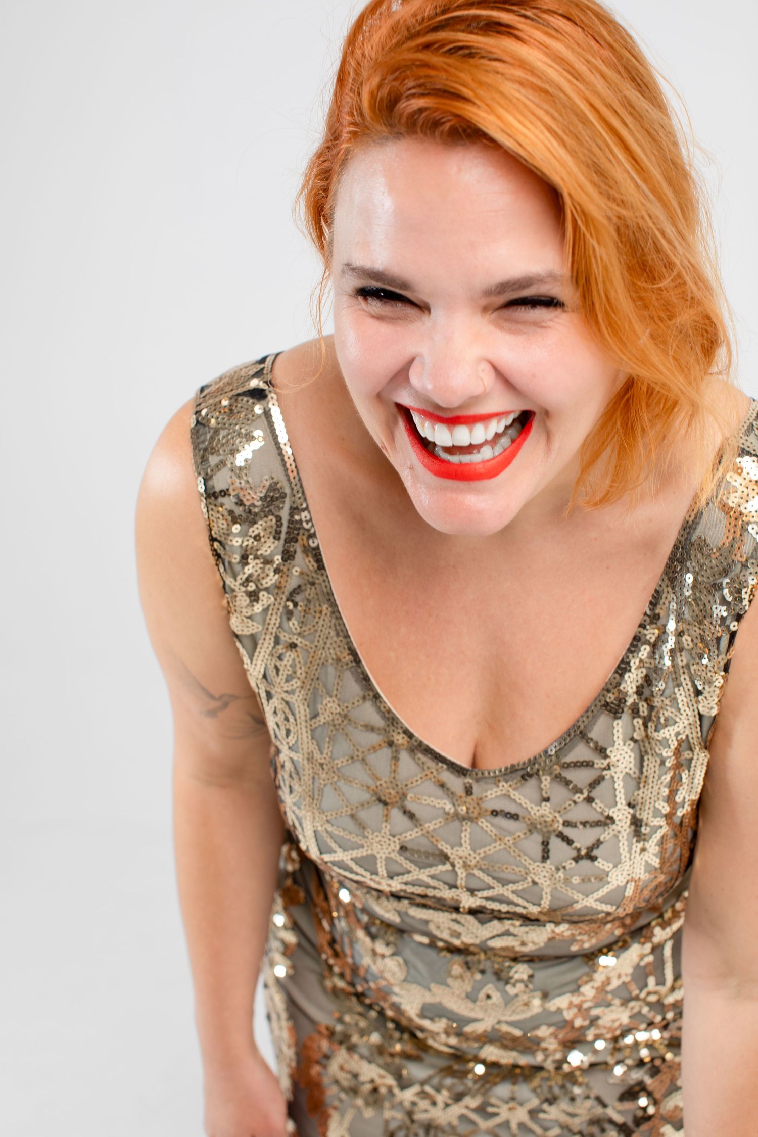 Glamorous sequined gold dress captured in multiple dynamic poses against white backdrop.