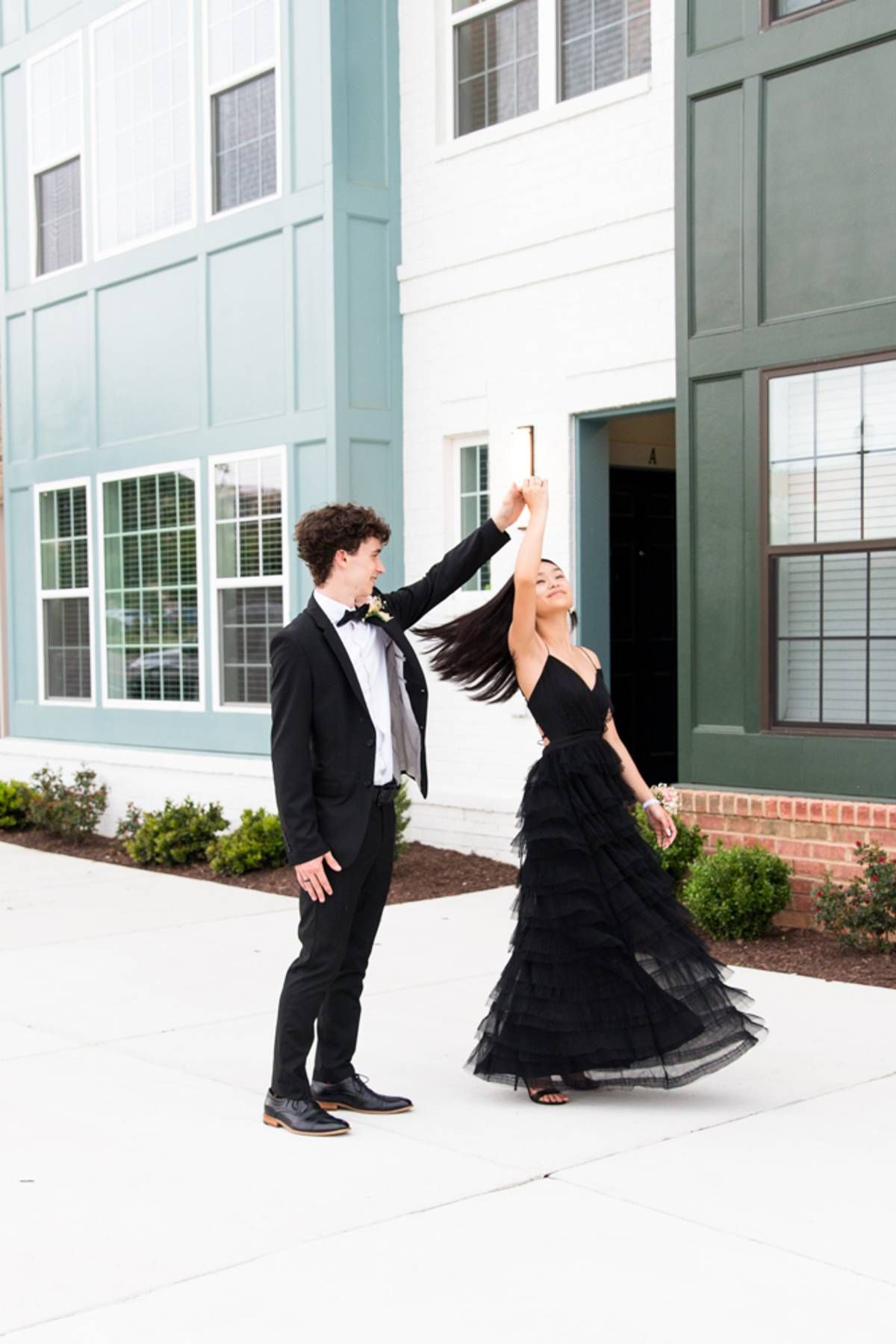 Prom photo of teen couple. Dancing, spinning couple. Richmond senior photography, RVA senior photographer. Family photographer RVA.
