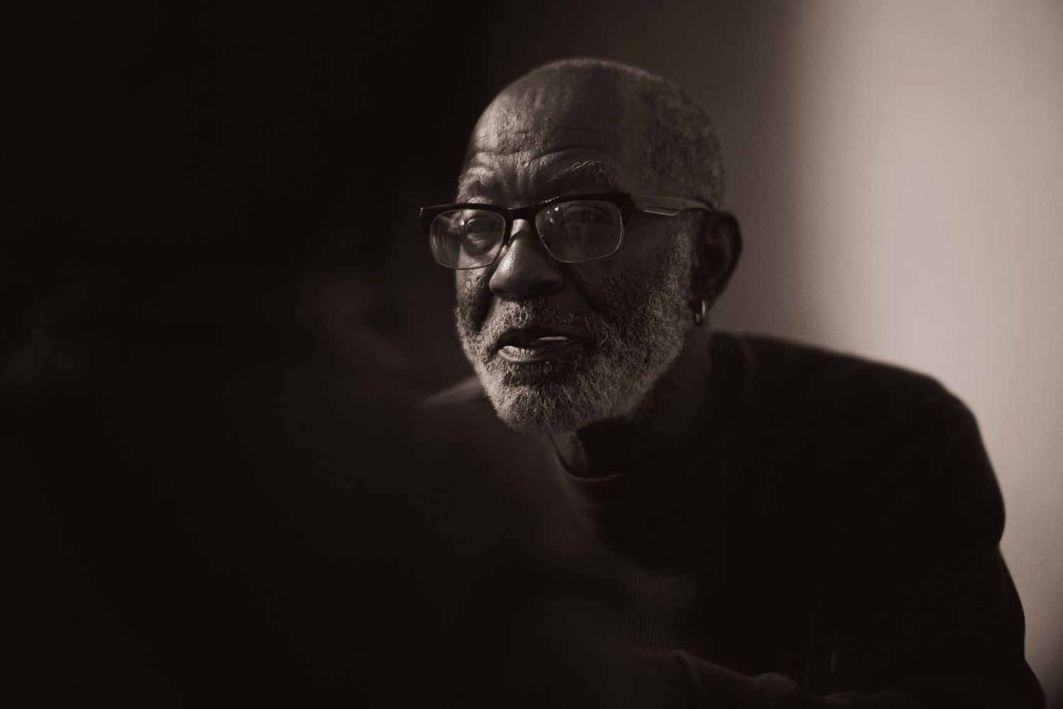 Black and white dramatic portrait highlighting creative ambient lighting, produced by Quinton Cole Media in Chattanooga.