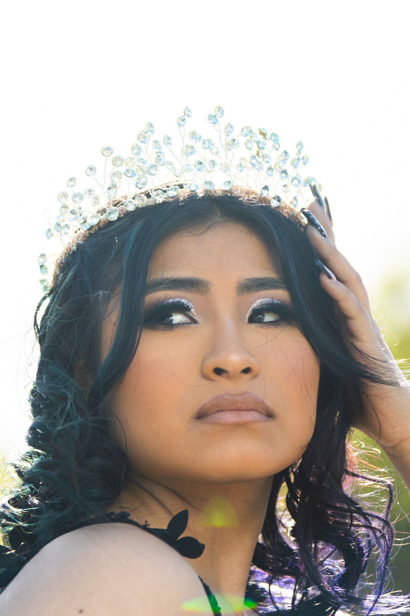 Close-up dramatic portrait highlighting creative studio lighting and high-fashion styling, produced by Quinton Cole Media in Metro Atlanta.