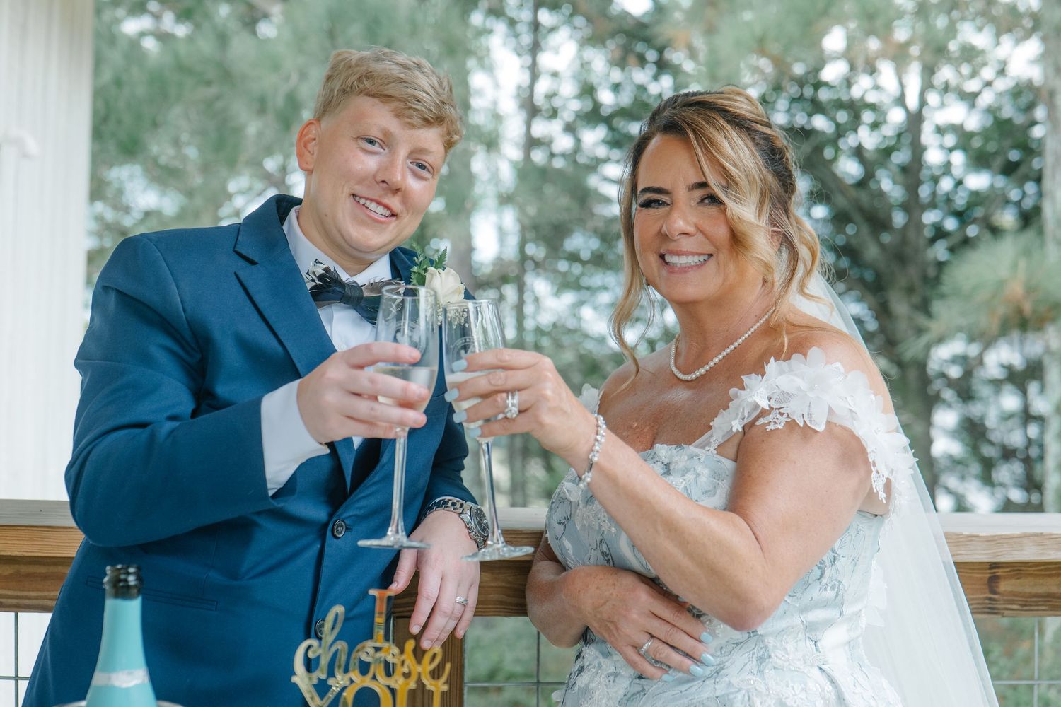 Joyful newlyweds confetti send-off, captured by wedding photographer Quinton Cole Media.