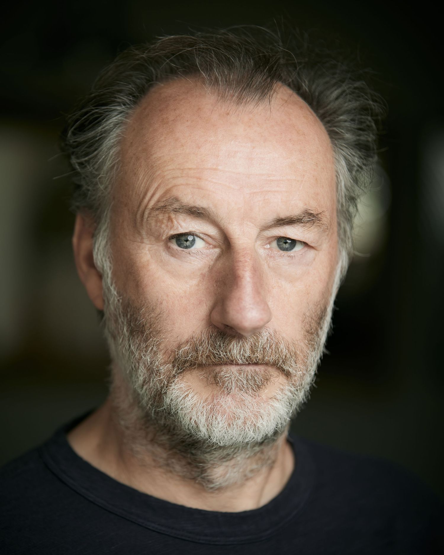 Natural light close-up; neutral character look with organic bokeh for Cardiff actors.