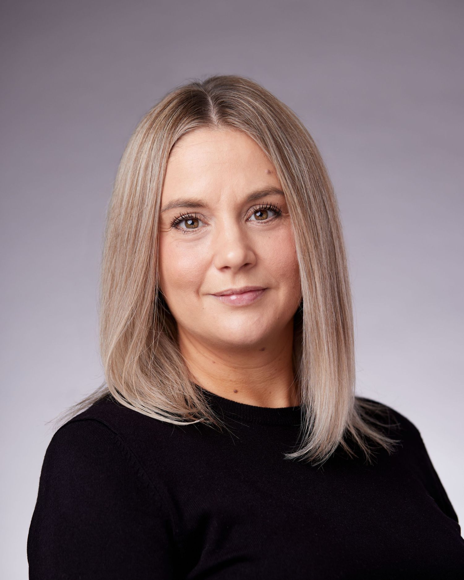 Geraint Todd business headshot; professional woman with a warm and empathetic presence in Cardiff.