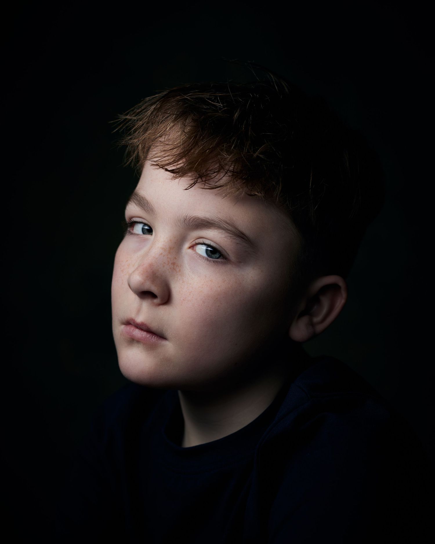 Edgy character portrait; boy with a raw, modern energy for TV drama.