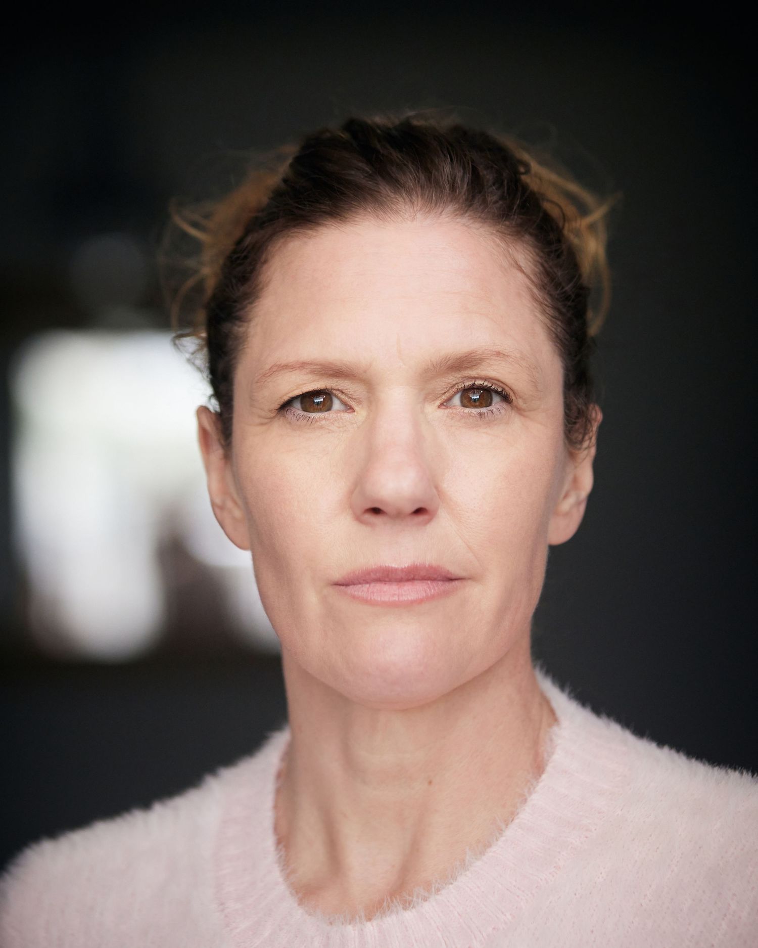 Cardiff-based headshot; edgy expression in natural light.