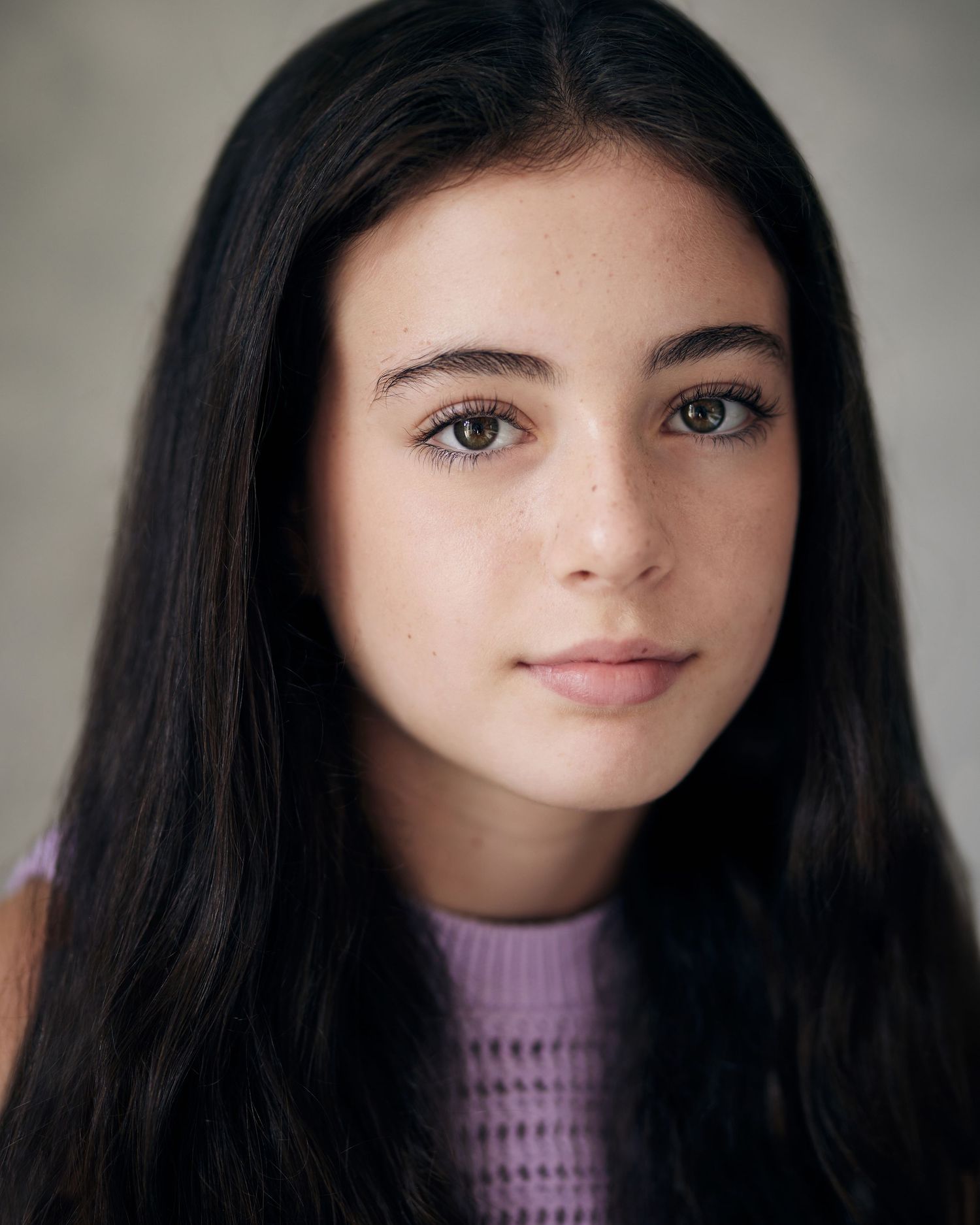Versatile portrait; girl with a neutral, balanced expression for multiple casting types.