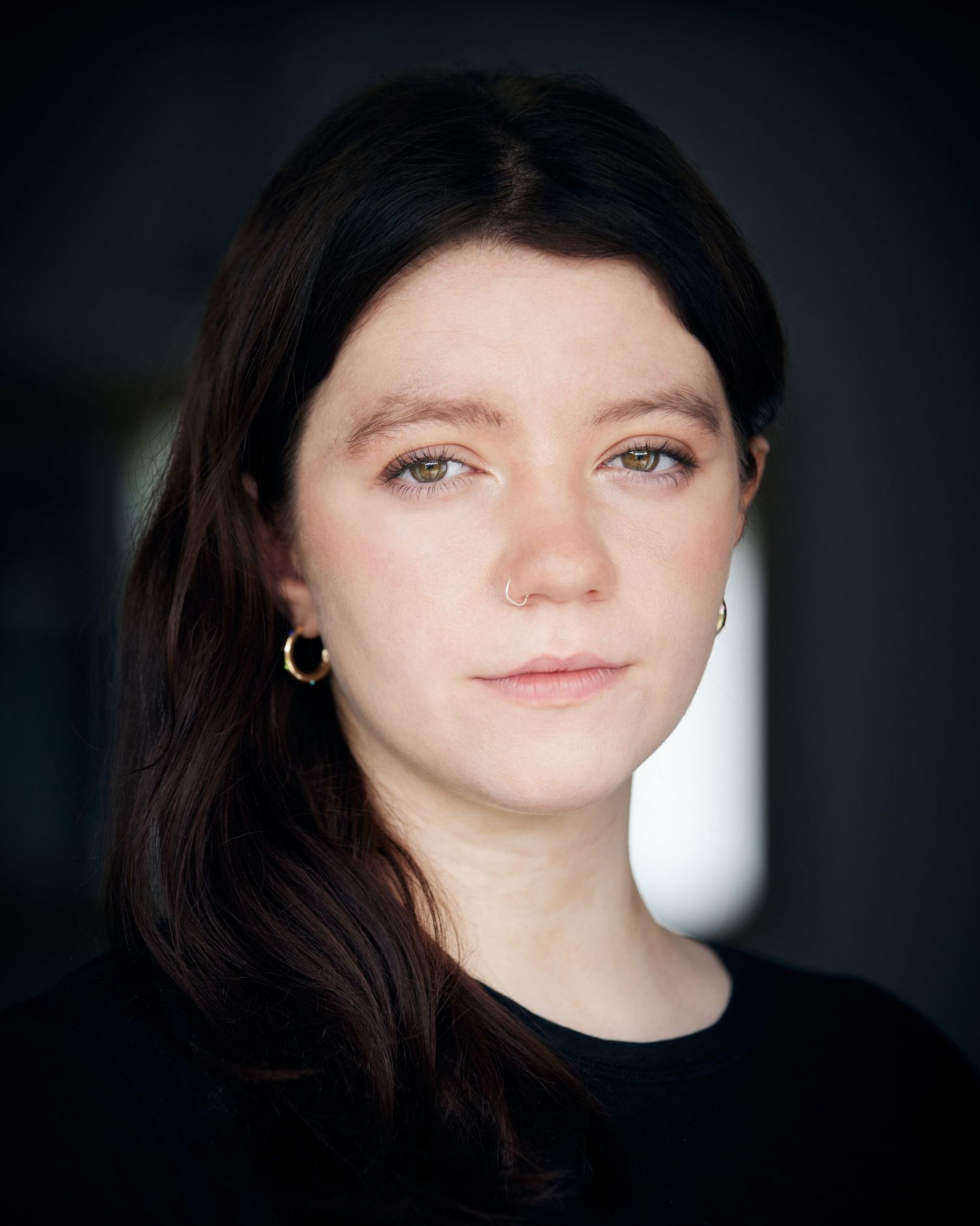 Cold natural light portrait; Cardiff actress with a tough, unyielding look.