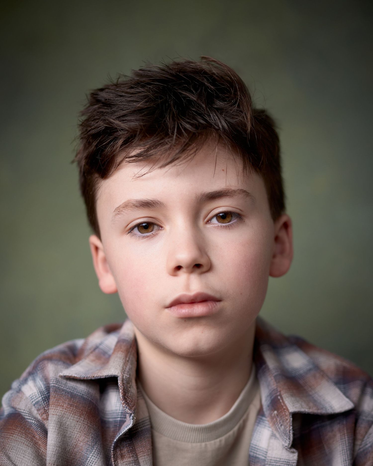 Actor Dylan with a gritty and contemporary expression, photographed by Cardiff headshot photographer Geraint Todd.