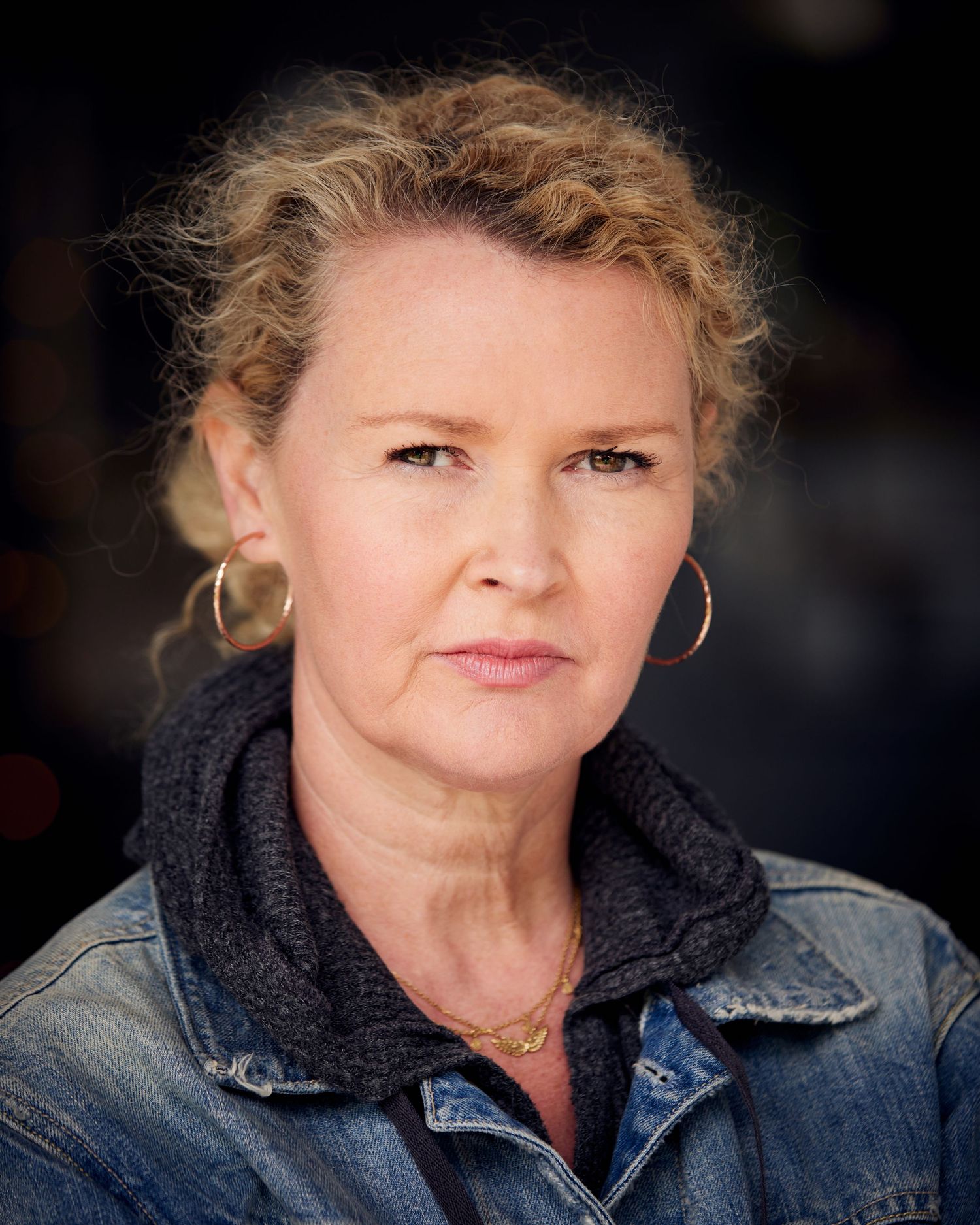 Authentic gritty headshot; actress with a raw Cardiff natural light look.