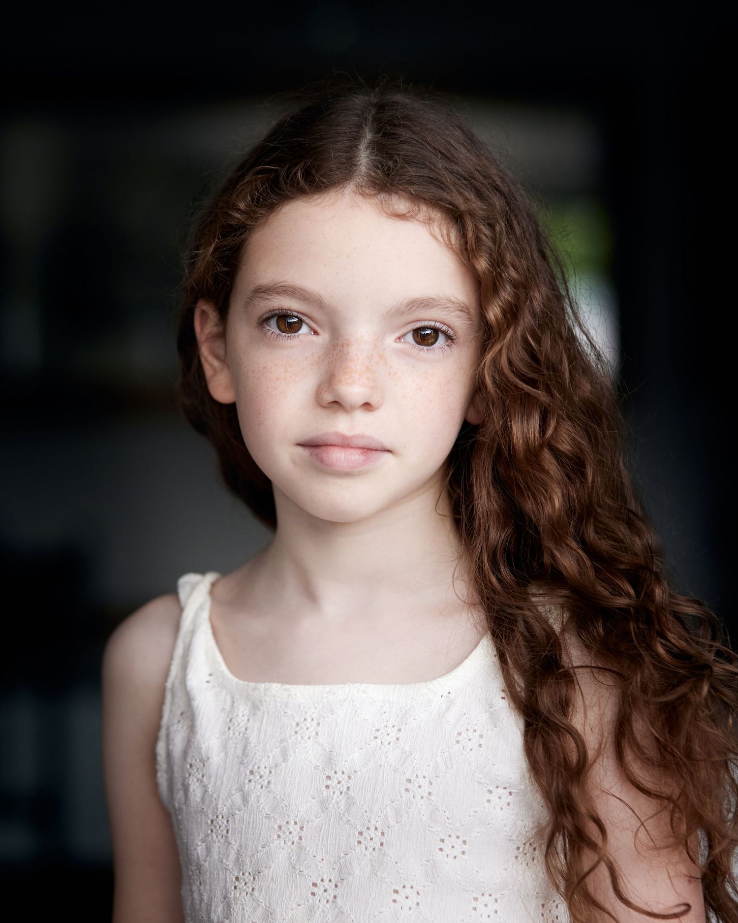 Natural child actor headshot for Spotlight and young performer casting in Cardiff.