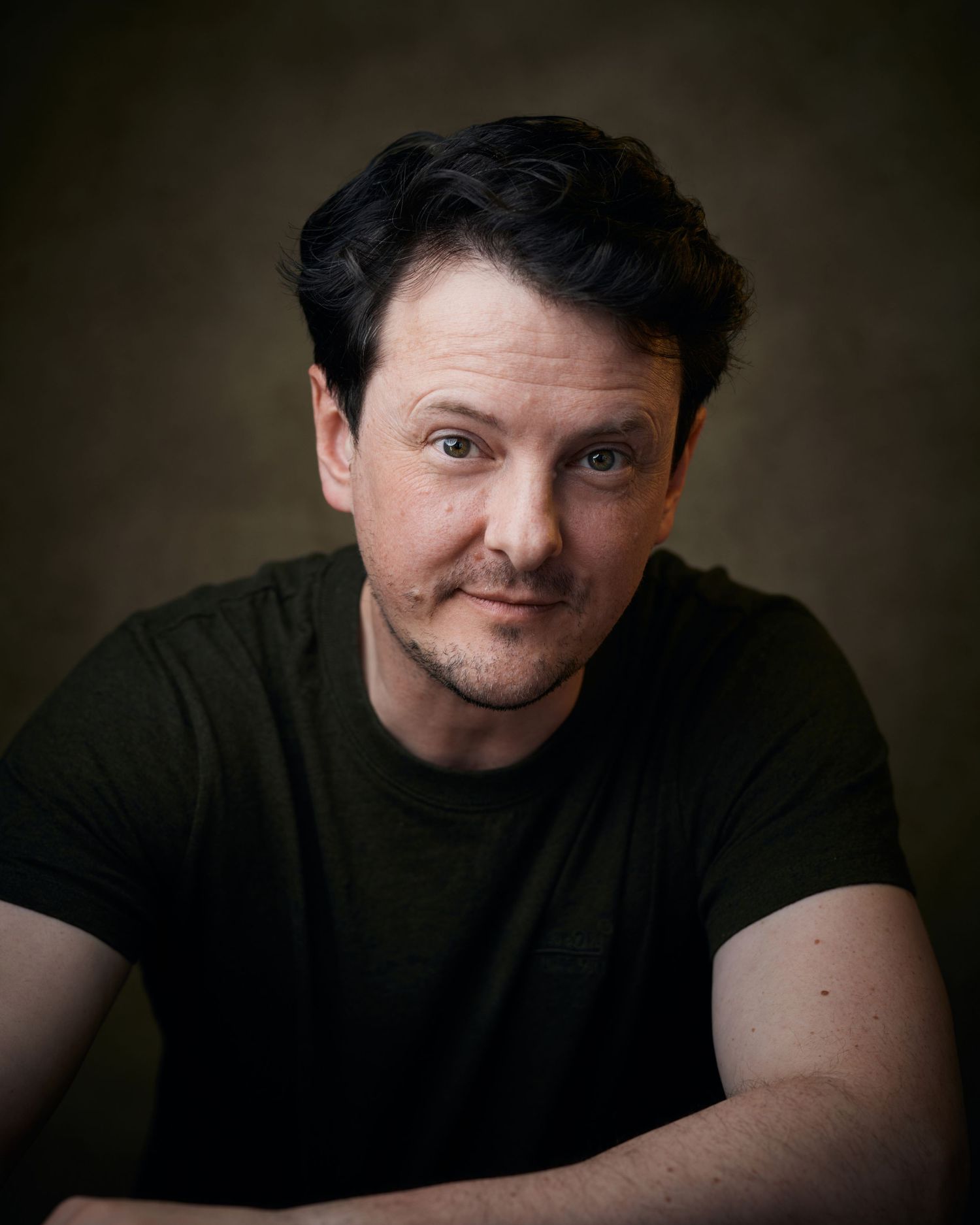Expressive joyful portrait; actor with a lively and animated happy look.