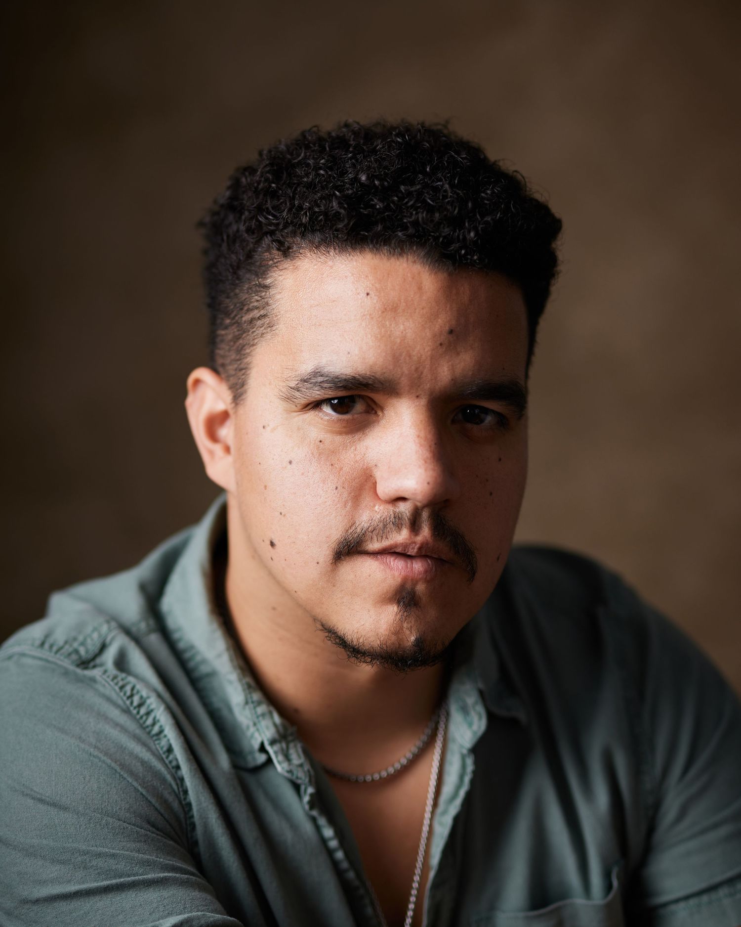 Cinematic male portrait with active gaze. Soulful leading man headshot for film and TV actors. Expert actor direction in Cardiff studio.