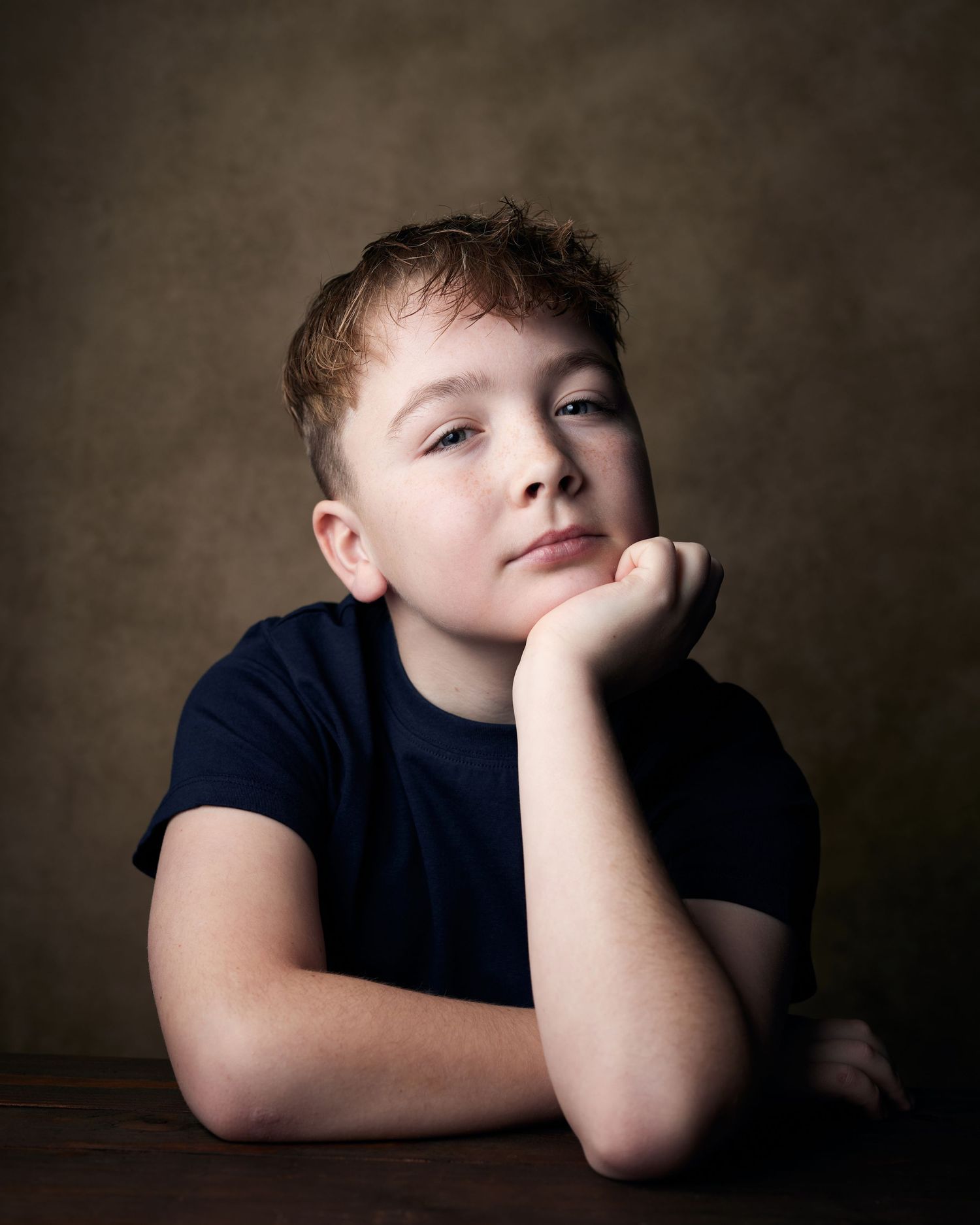 Modern studio portrait; young actor with a bold, 