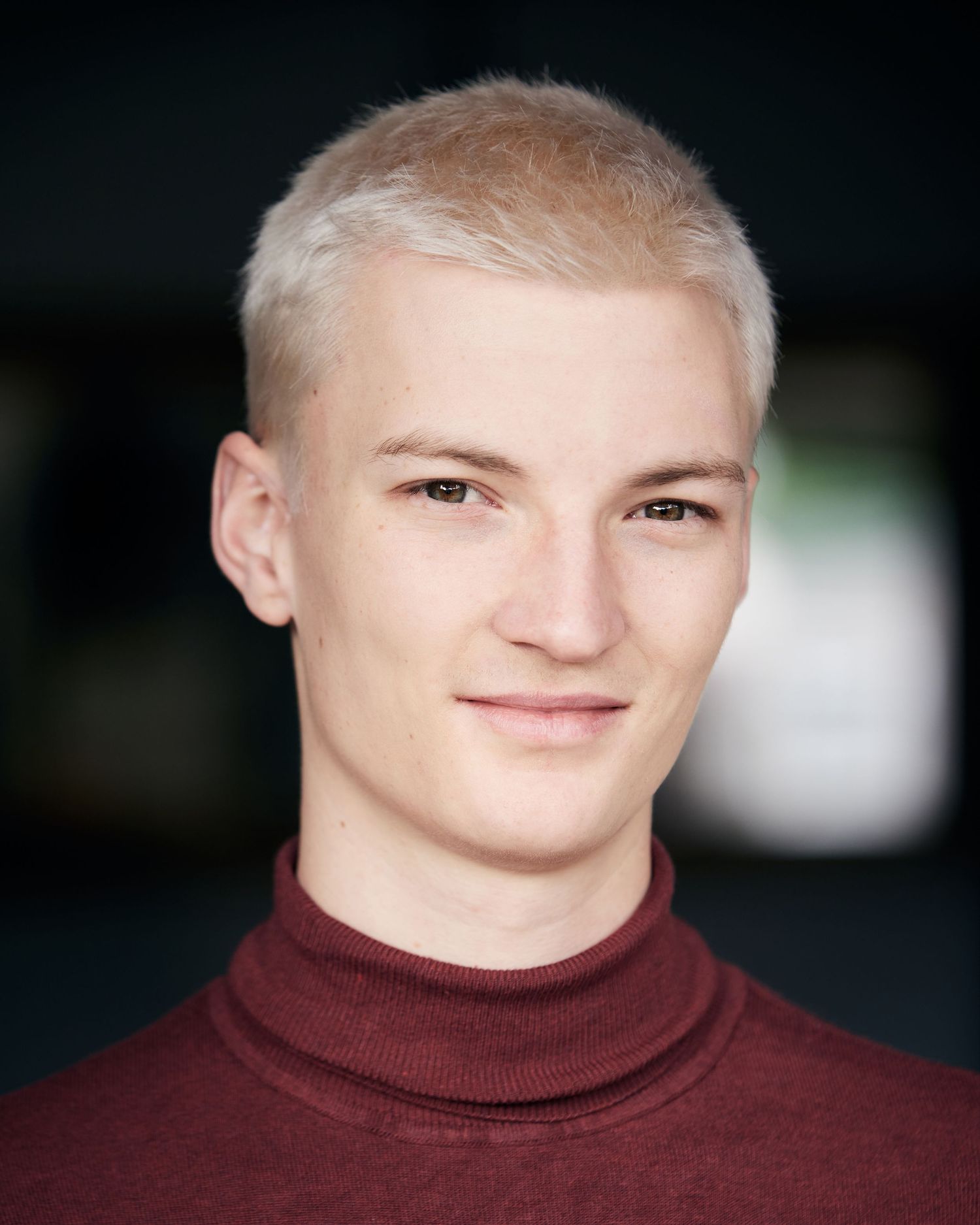 Strong-eyed portrait; strong character energy in Cardiff natural light.