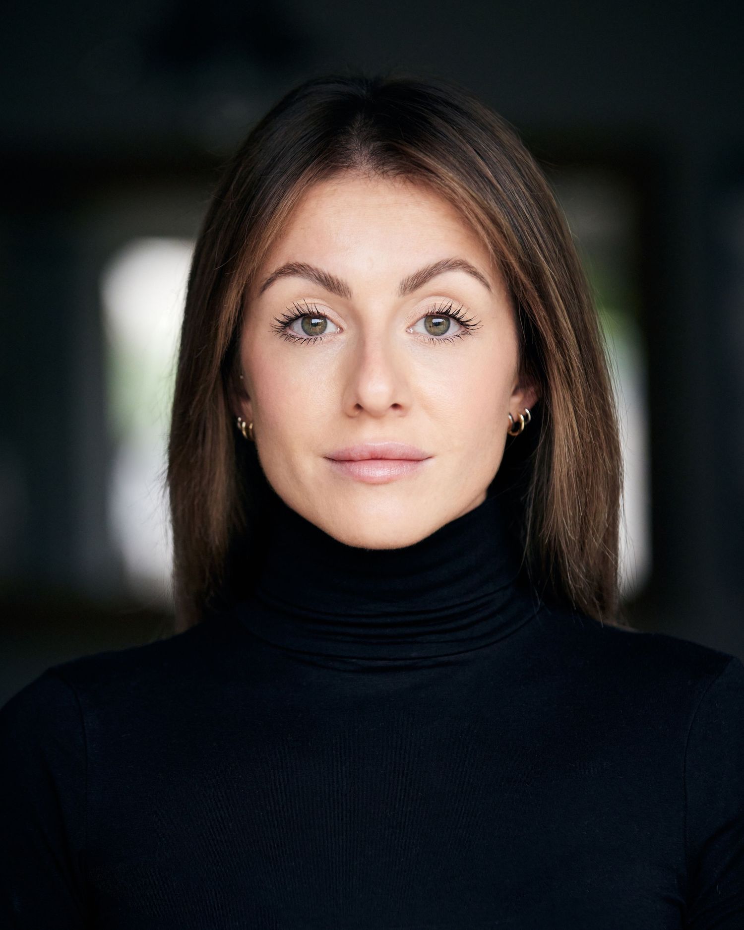 Modern and focused portrait; actress with edgy Cardiff character energy.